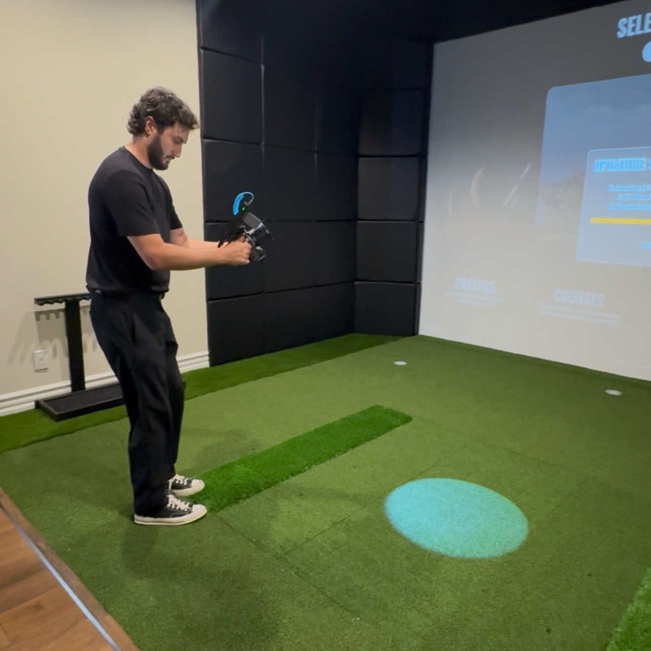 Payton, owner of Off Balance Media on site filming content to be ran as meta ads on his Sony Fx3A for Premier Golf Sims