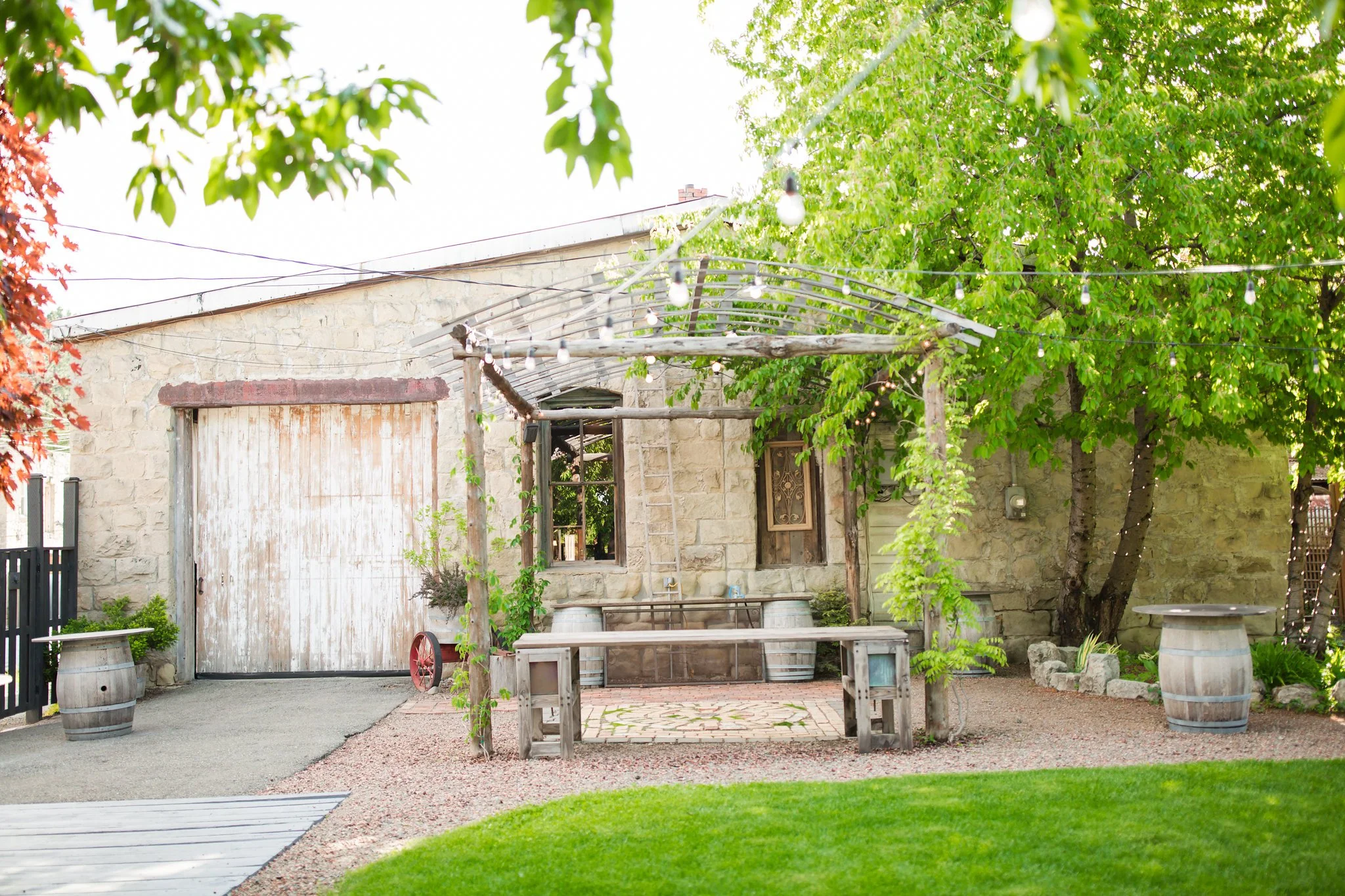 An image of the historic building at StoneHouse101. StoneHouse101 is an intimate indoor outdoor events venue in Roslyn, Washington, hosting weddings, birthdays, anniversaries, and more near Cle Elum, WA.