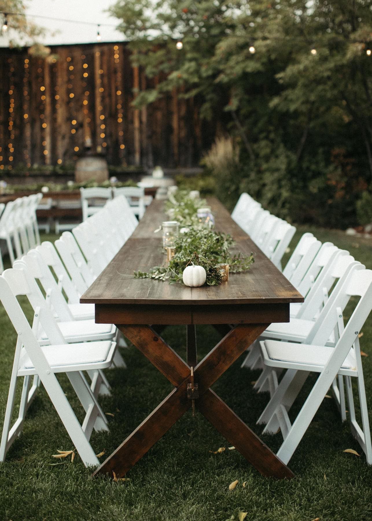 An elegant table setting for an outdoor party at StoneHouse101 Events Venue. StoneHouse101 is an intimate indoor outdoor events venue in Roslyn, Washington, hosting weddings, birthdays, anniversaries, and more near Cle Elum, WA.