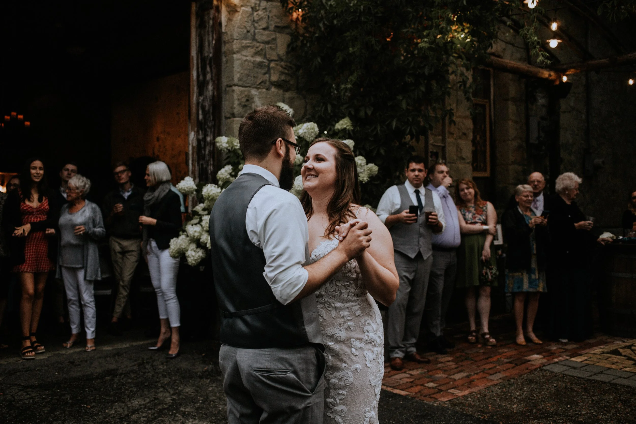 An image of 2 guests dancing at an event at StoneHouse101. StoneHouse101 is an intimate indoor outdoor events venue in Roslyn, Washington, hosting weddings, birthdays, anniversaries, and more near Cle Elum, WA.