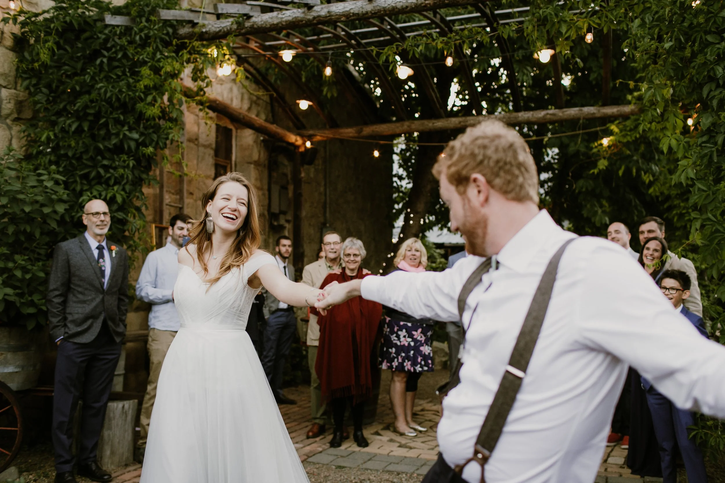 An image of a bride and groom dancing at their StoneHouse101 wedding event venue near Cle Elum, Washington, in the charming town of Roslyn.