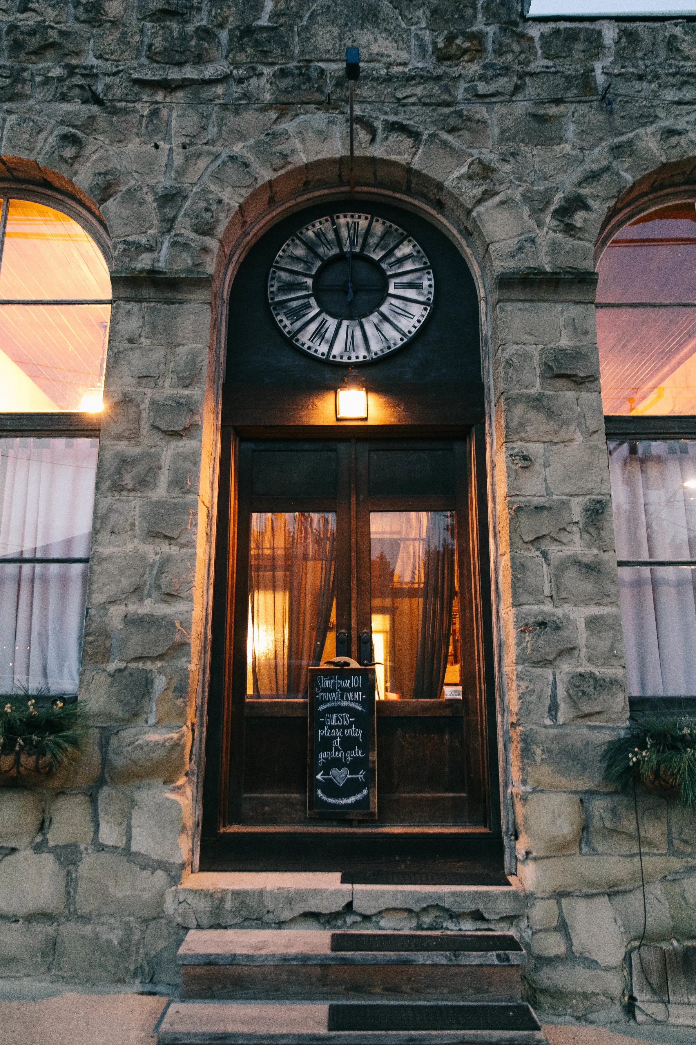 An image of the entrance to StoneHouse101. StoneHouse101 is an intimate indoor outdoor events venue in Roslyn, Washington, hosting weddings, birthdays, anniversaries, and more near Cle Elum, WA.