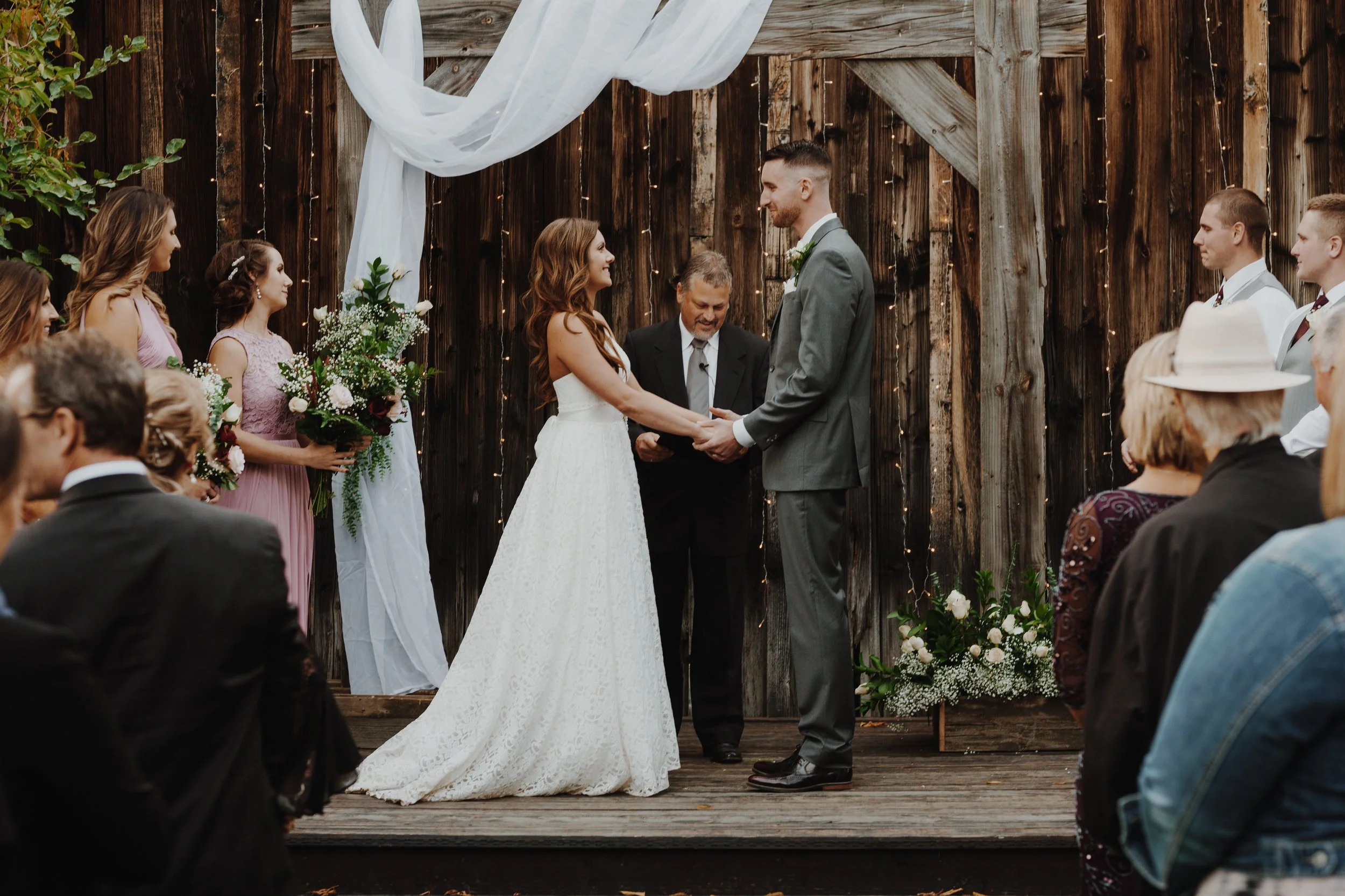 An image of an outdoor wedding ceremony at StoneHouse101. StoneHouse101 is an intimate indoor outdoor events venue in Roslyn, Washington, hosting weddings, birthdays, anniversaries, and more near Cle Elum, WA.