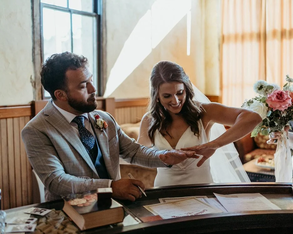 An image of a bride and groom after their indoor wedding ceremony at StoneHouse101. StoneHouse101 is an intimate indoor outdoor events venue in Roslyn, Washington, hosting weddings, birthdays, anniversaries, and more near Cle Elum, WA.