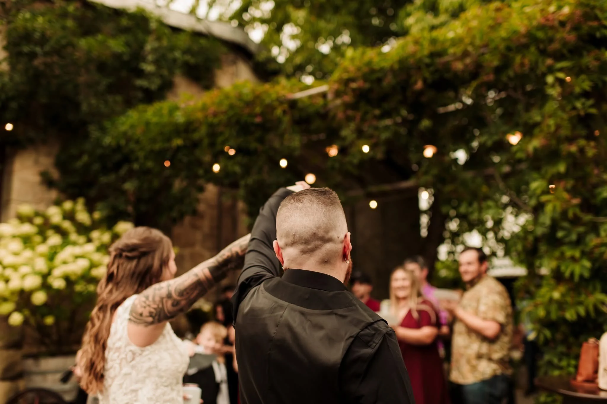 An image of of a bride and groom at StoneHouse101. StoneHouse101 is an intimate indoor outdoor events venue in Roslyn, Washington, hosting weddings, birthdays, anniversaries, and more near Cle Elum, WA.