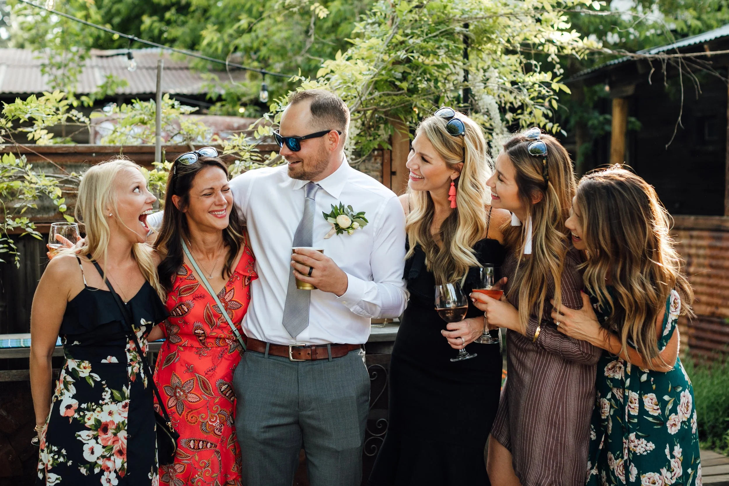 StoneHouse101 guests smiling and laughing while at an event at StoneHouse101. StoneHouse101 hosts birthdays, anniversaries, corporate events, and other celebrations near Cle Elum, Washington.