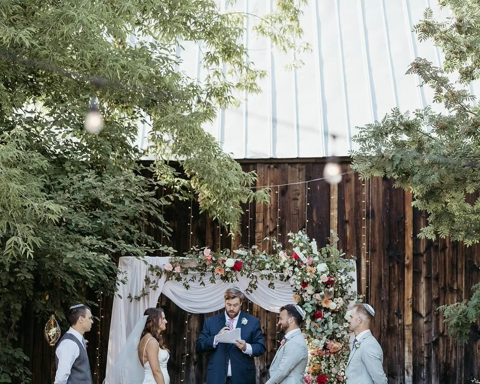 An image of an outdoor wedding ceremony at StoneHouse101 in Roslyn. StoneHouse101 is an intimate indoor outdoor events venue in Roslyn, Washington, hosting weddings, birthdays, anniversaries, and more near Cle Elum, WA.