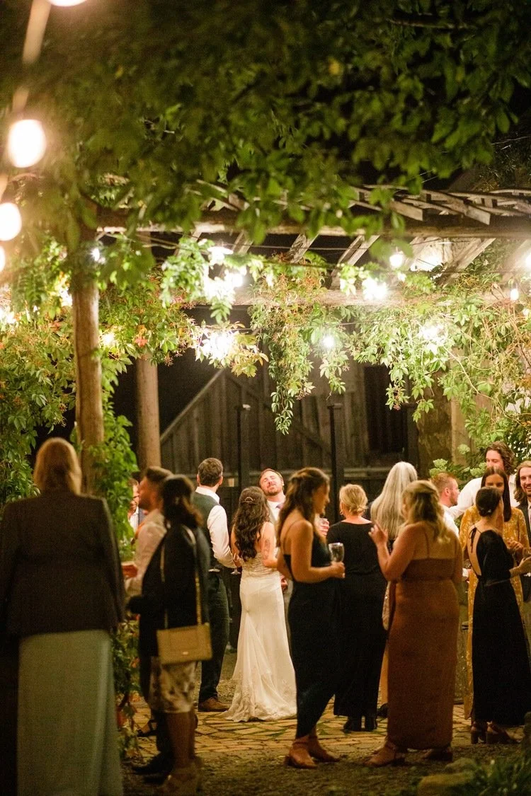 An image of guests at an outdoor event at StoneHouse101. StoneHouse101 is an intimate indoor outdoor events venue in Roslyn, Washington, hosting weddings, birthdays, anniversaries, and more near Cle Elum, WA.