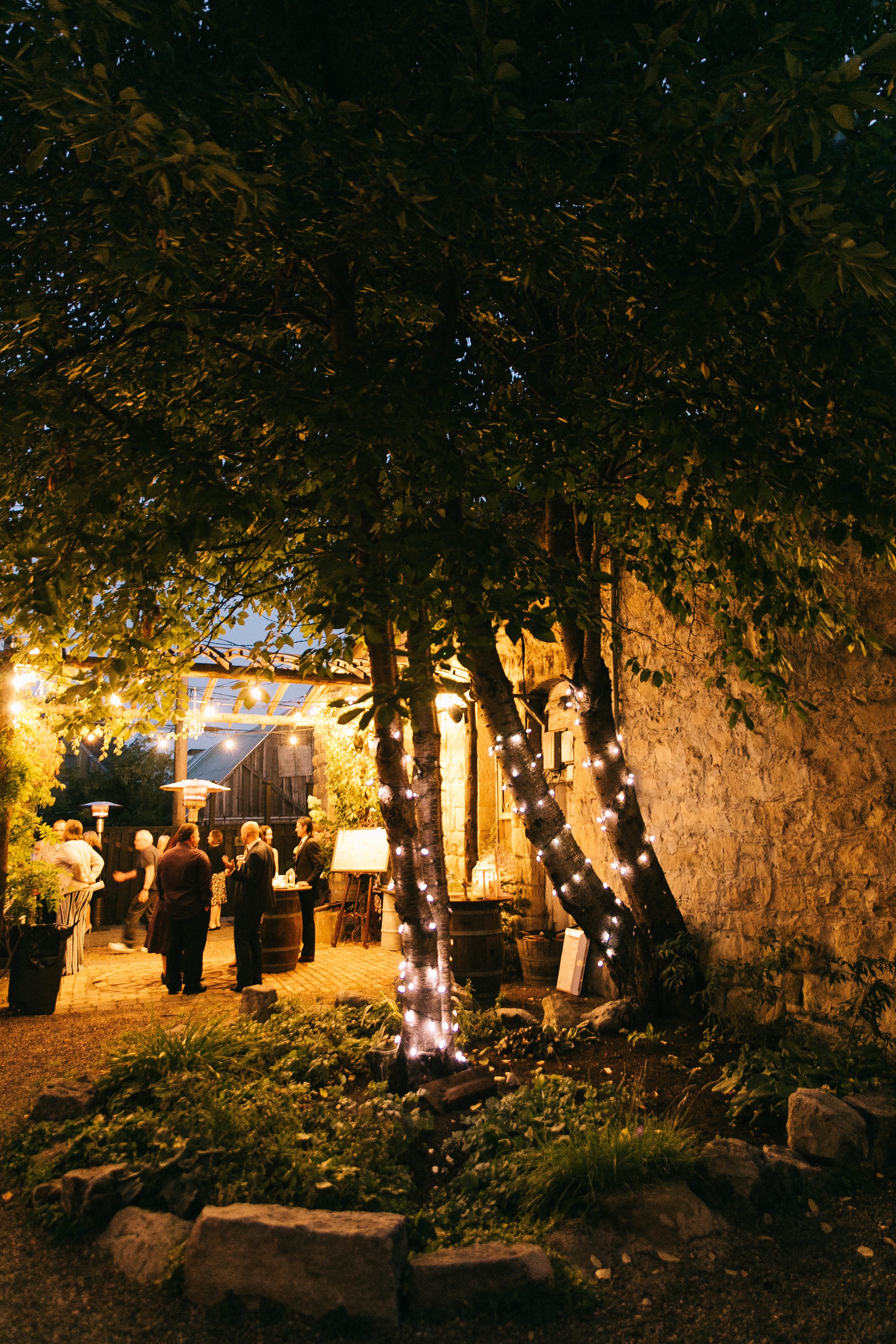 An image of StoneHouse101 during an evening event. StoneHouse101 is an intimate indoor outdoor events venue in Roslyn, Washington, hosting weddings, birthdays, anniversaries, and more near Cle Elum, WA.