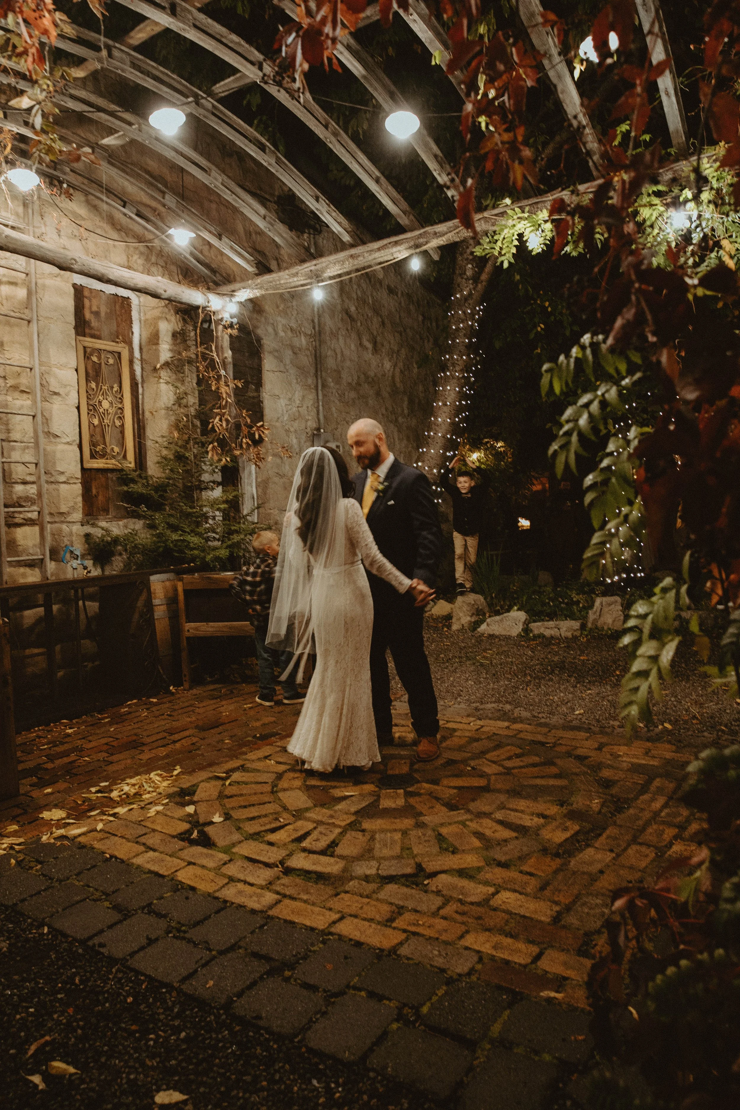An image of a bride and groom dancing at their outdoor wedding venue in Kittitas County. StoneHouse101 is an intimate indoor outdoor events venue in Roslyn, Washington, hosting weddings, birthdays, anniversaries, and more near Cle Elum, WA.