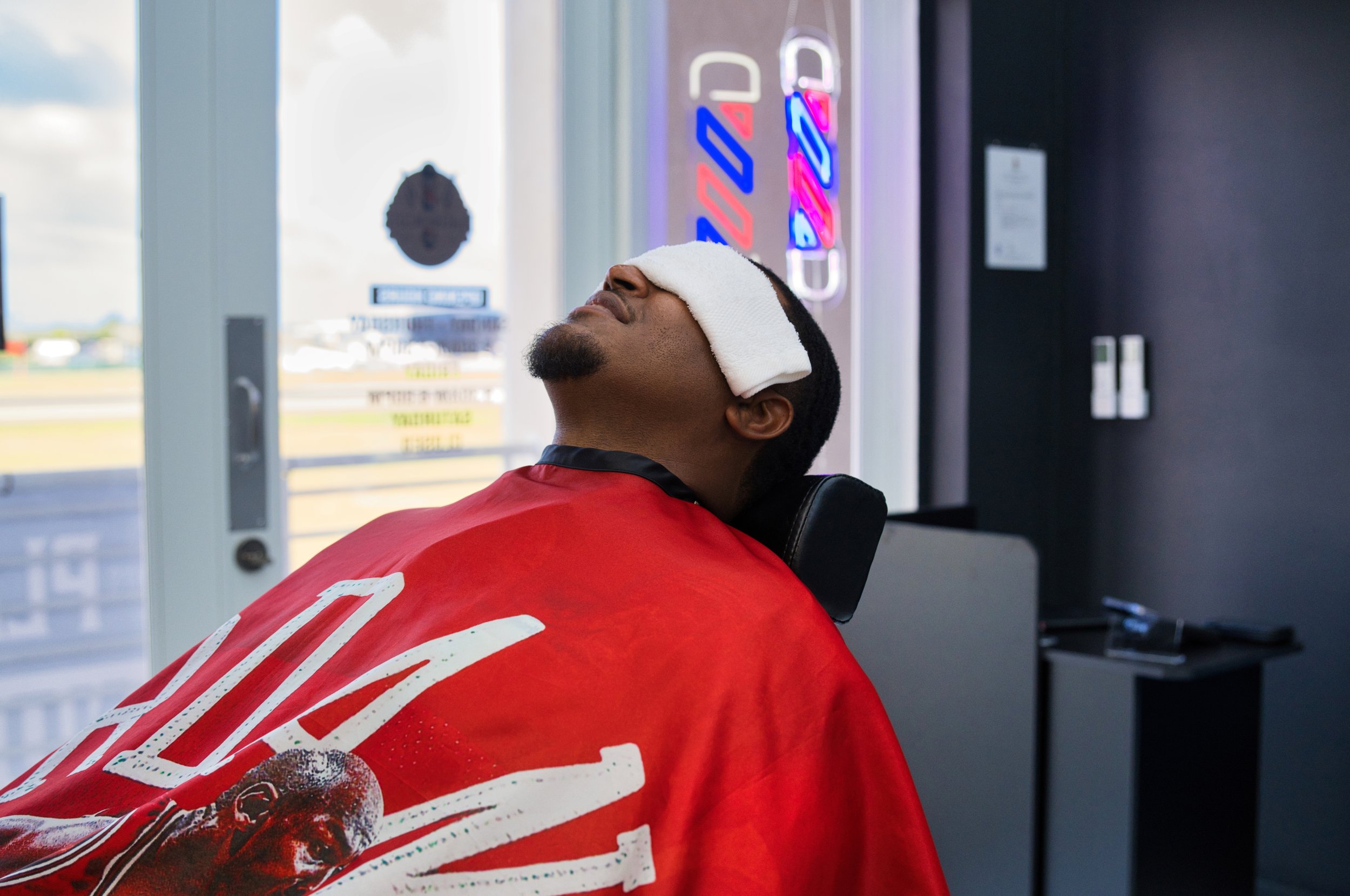 Enjoy ultimate luxury and unmatched service at Platinum Cuts Barbershop with our signature hot towel treatment