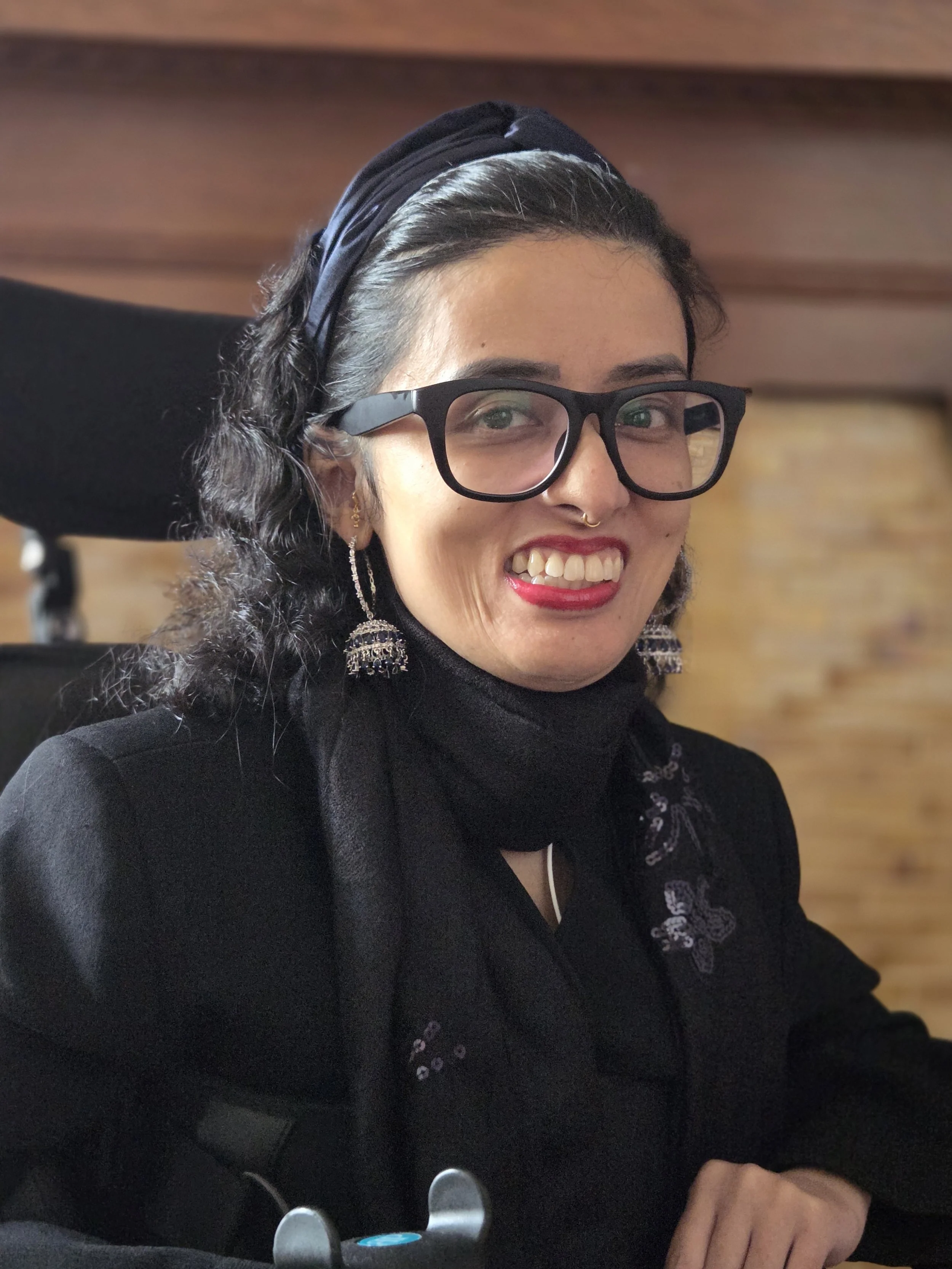 Photo of Naina, therapist, speaker, and consultant.