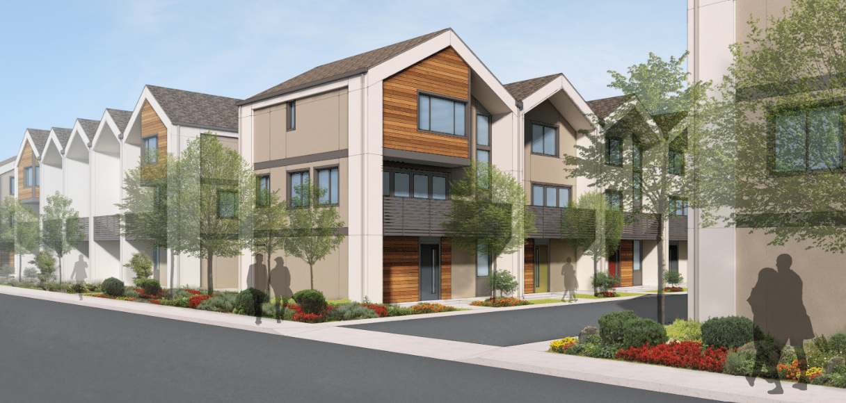 Modern townhouse complex with three-story buildings, trees, and landscaped gardens.