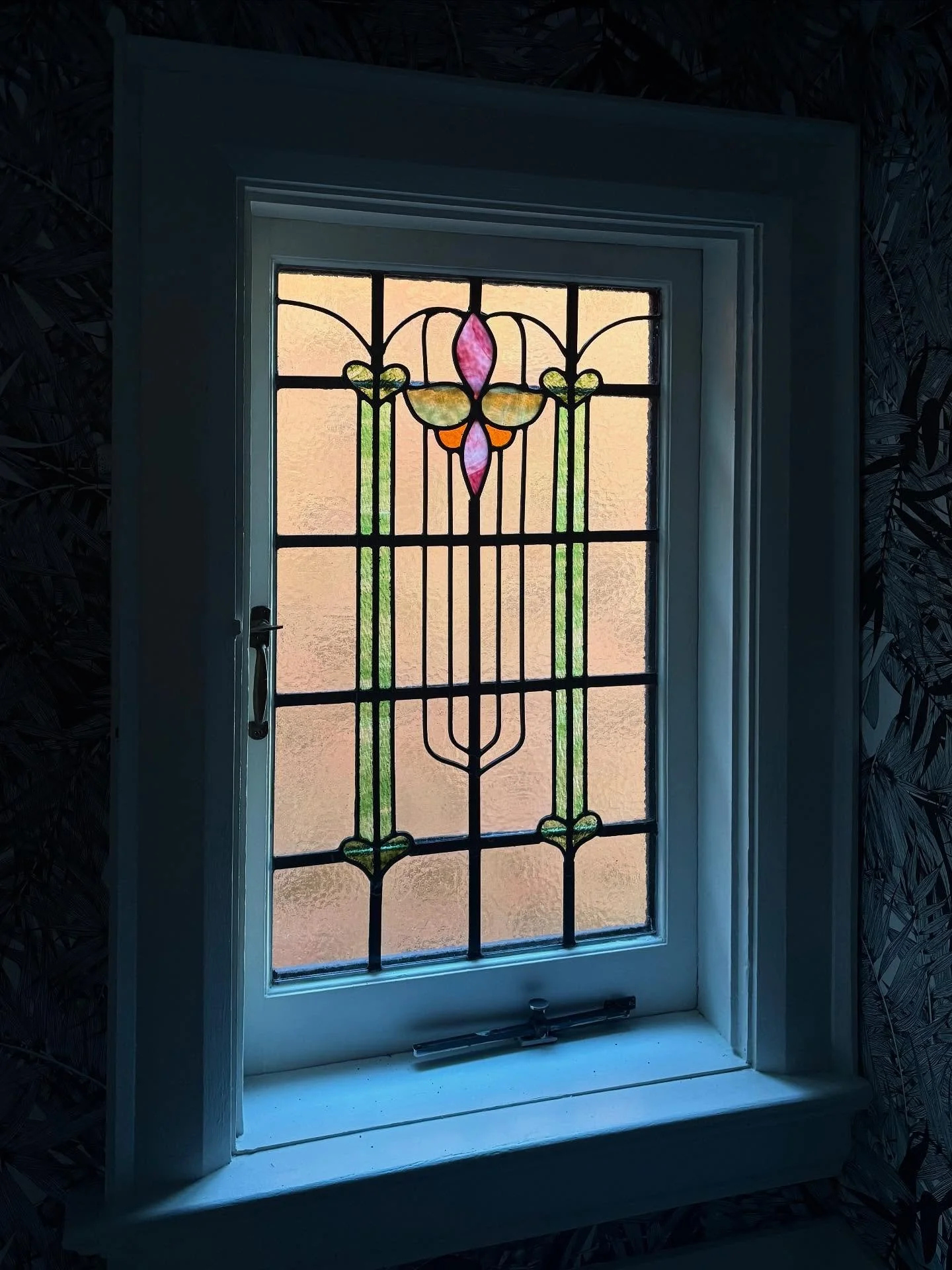 This 31x18 restoration complete and installed!

This beautiful window was brought back to life after over 100 years of wear and tear. The old lead had begun to break down, allowing cold drafts to creep in and drive up energy costs for the home, and t