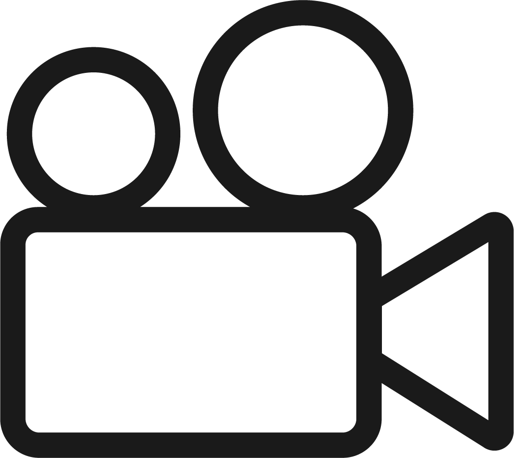 Icon of a vintage video camera with two reels on top and a protruding lens.