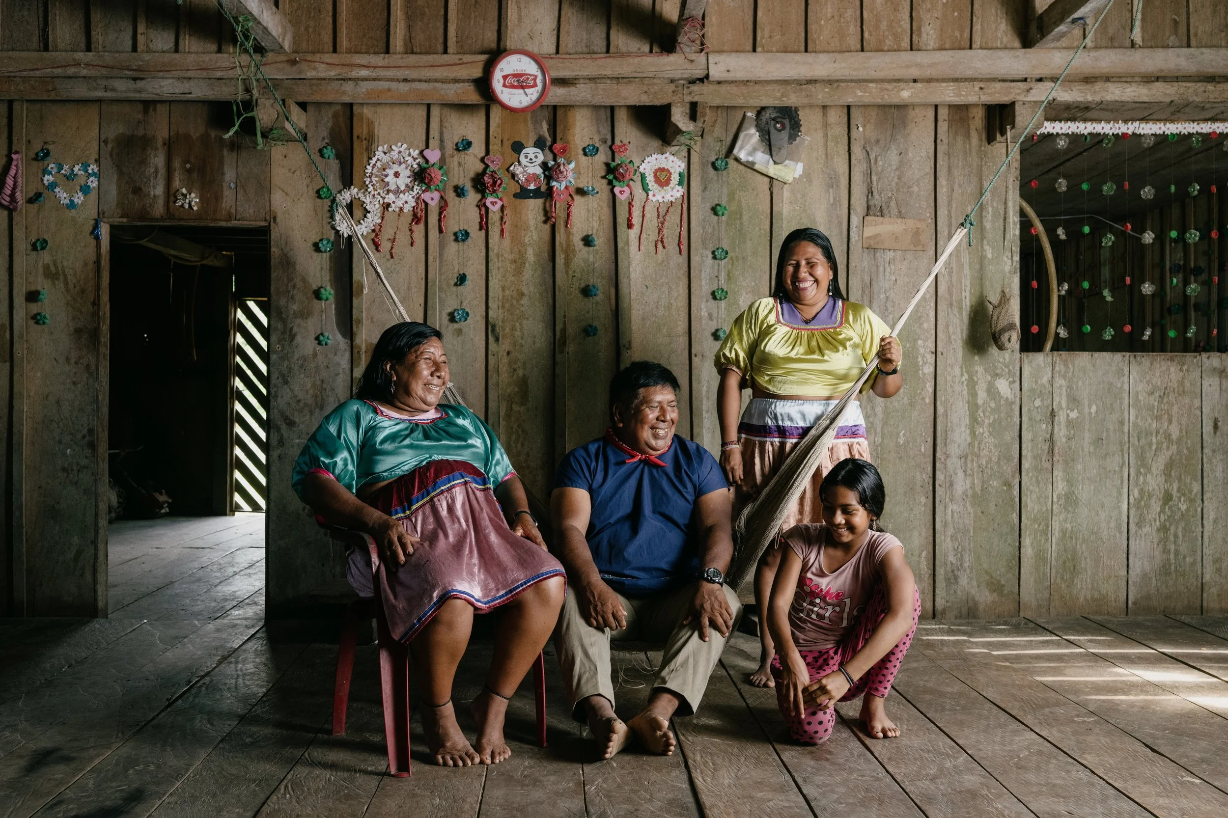  By protecting their environment, the Cofán seek to maintain the conditions in which their families have traditionally flourished. Pictured here: (left to right) Joaquina Criollo, Luis Quenama, their daughter Malene Quenama, and her daughter, Jhulysi