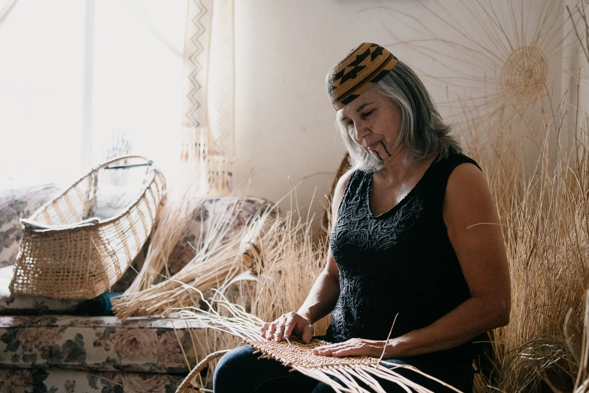  Margo Robbins weaves the start of a traditional Yurok baby carrier basket. Baskets carry great importance, and the ability to manage forests for basket materials has long driven Yurok forest management practices that make forests both more diverse a