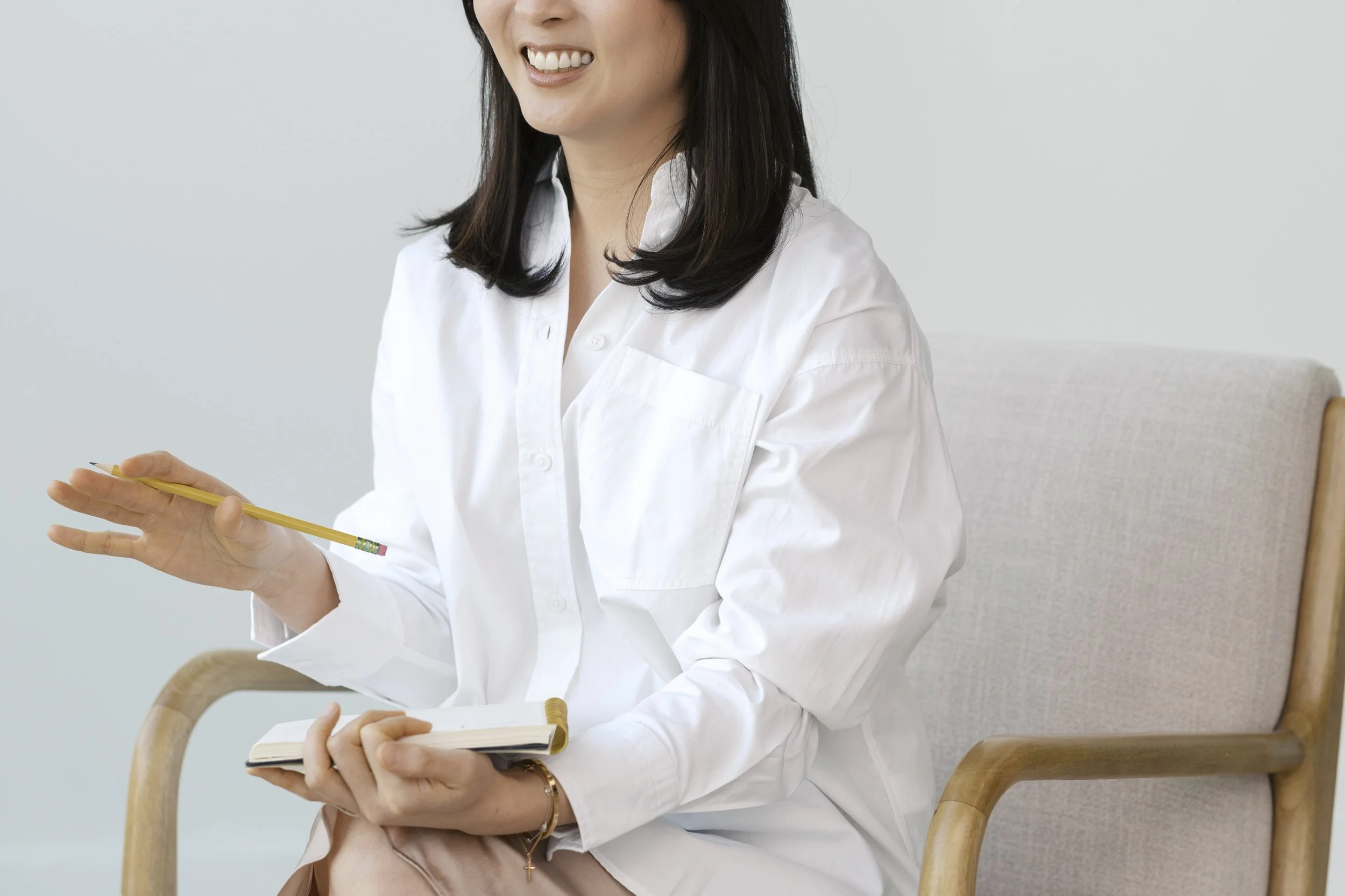 Juhee practicing inner child therapy during a session.