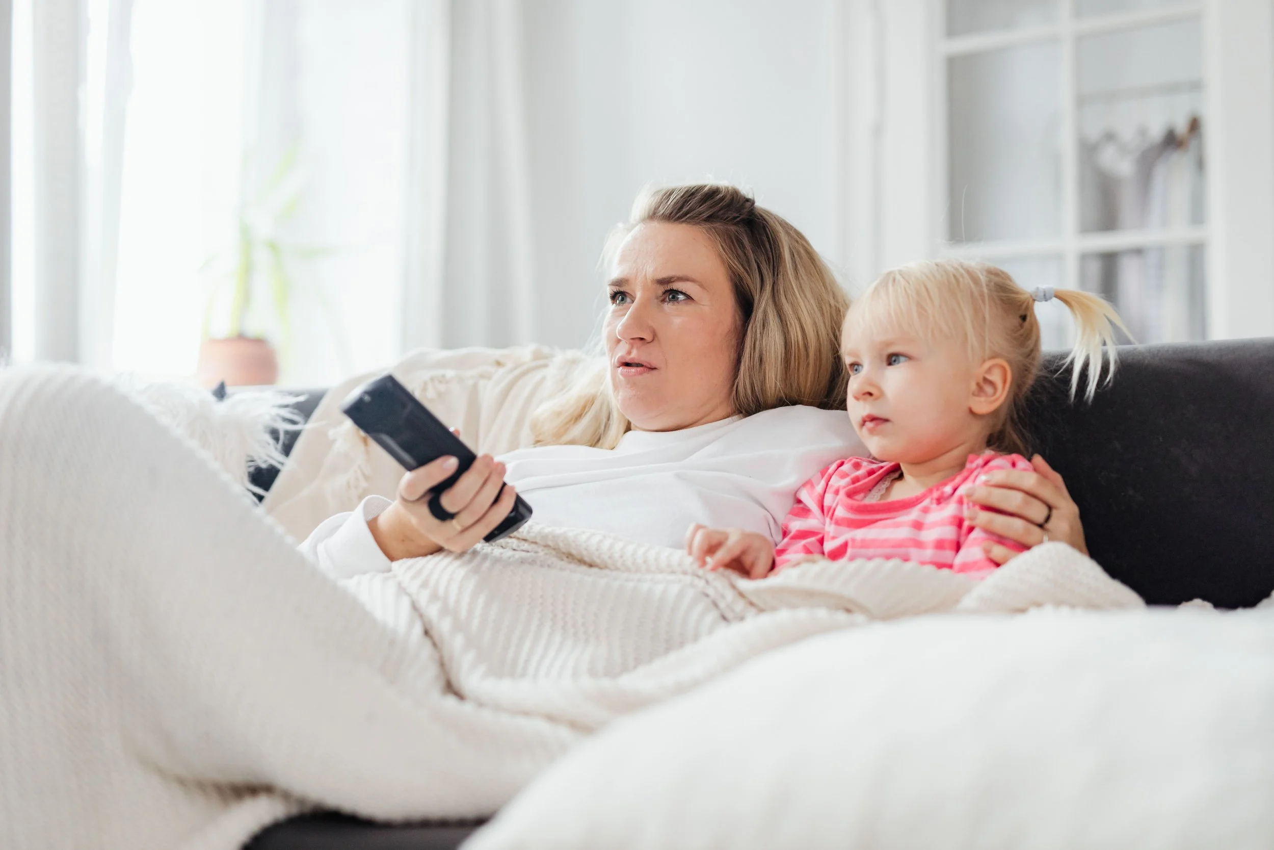 mom and toddler watching TV