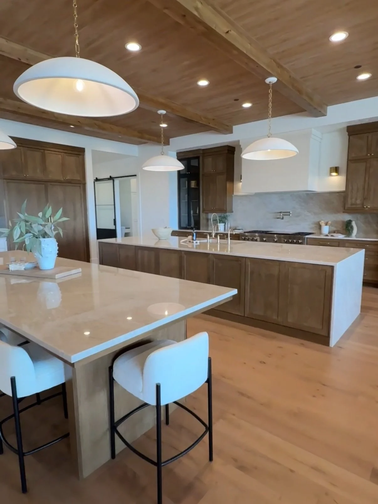 When Eric and I were designing our home, we kept toying with the idea of doing a double island like this. Ultimately, we didn&rsquo;t have quite enough space to make it feel like the right fit, but I&rsquo;m still completely obsessed with this look. 