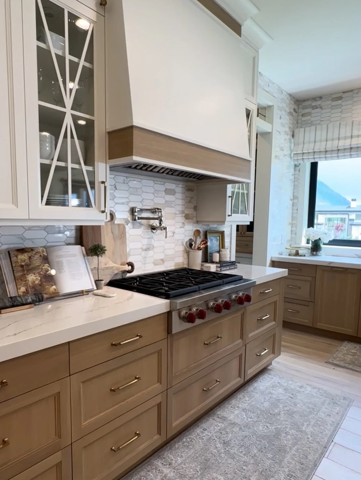 There are so many things about this home that I absolutely love, the mix of tile and design details, the beautiful millwork and lighting, and of course the pantry organization!!

When we were designing our own home, we even tossed around the idea of 