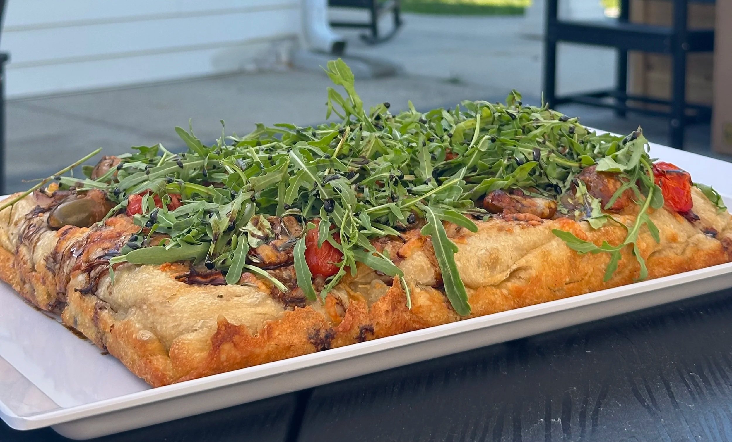 Cherry tomatoes, arugula, and balsamic sourdough focaccia