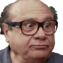 Close-up of a person with glasses, making a funny or puzzled facial expression