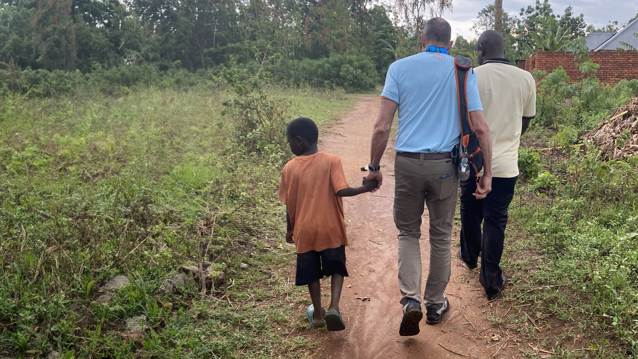 Walking alongside the Mbale people.