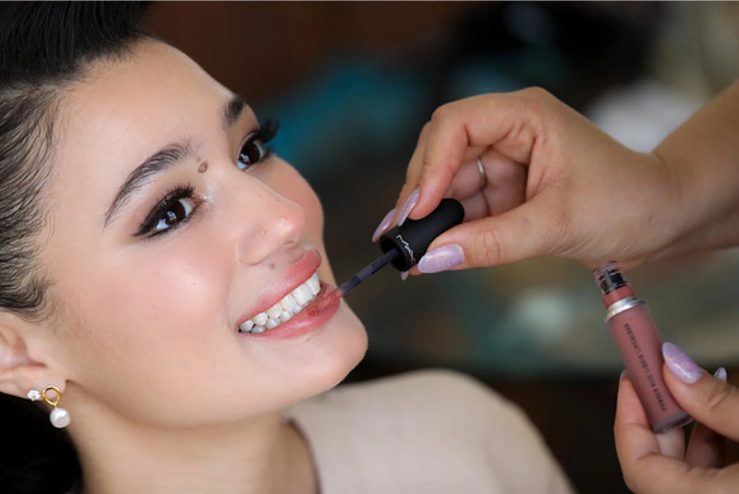 Bride getting ready makeup application by Georgia bridal makeup artist