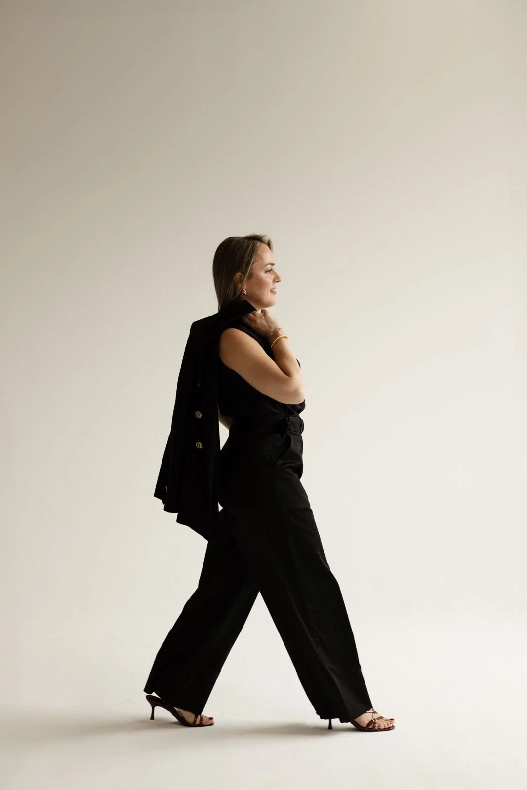 Debora Lengler in a black suit