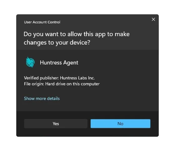A user account control prompt asking if the user wants to allow the app 'Huntress Agent' to make changes to the device, with options to select 'Yes' or 'No'.