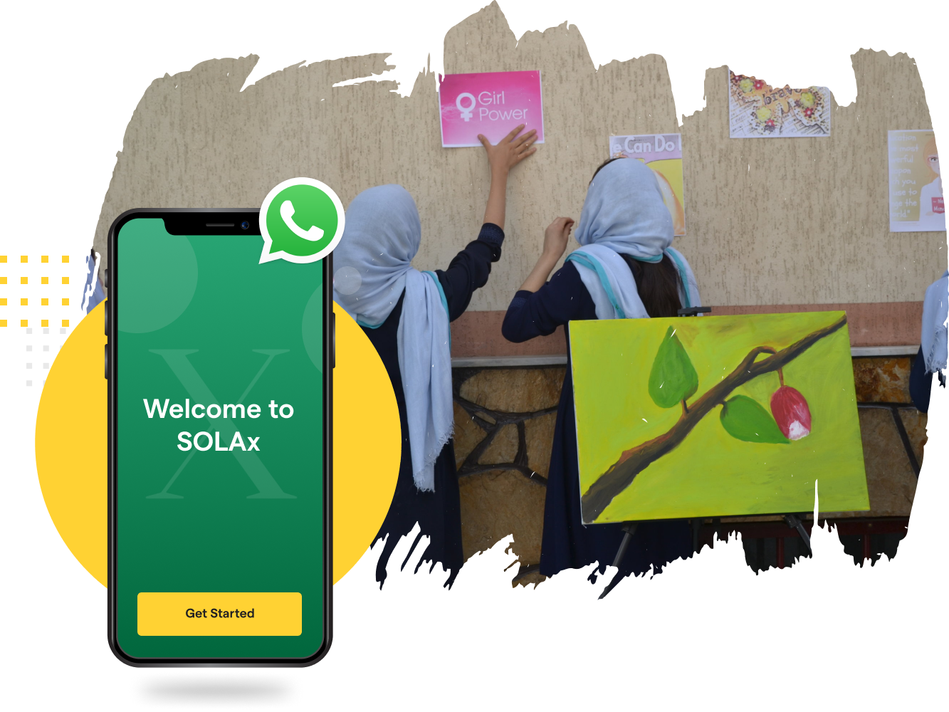 A school classroom with students wearing headscarves, two of whom are reaching for posters on the wall, one pink with a female symbol and the words 'Girl Power', and another yellow with a motivational message. In the foreground, there is an illustration of a smartphone displaying a 'Welcome to SOLAx' screen with a 'Get Started' button.