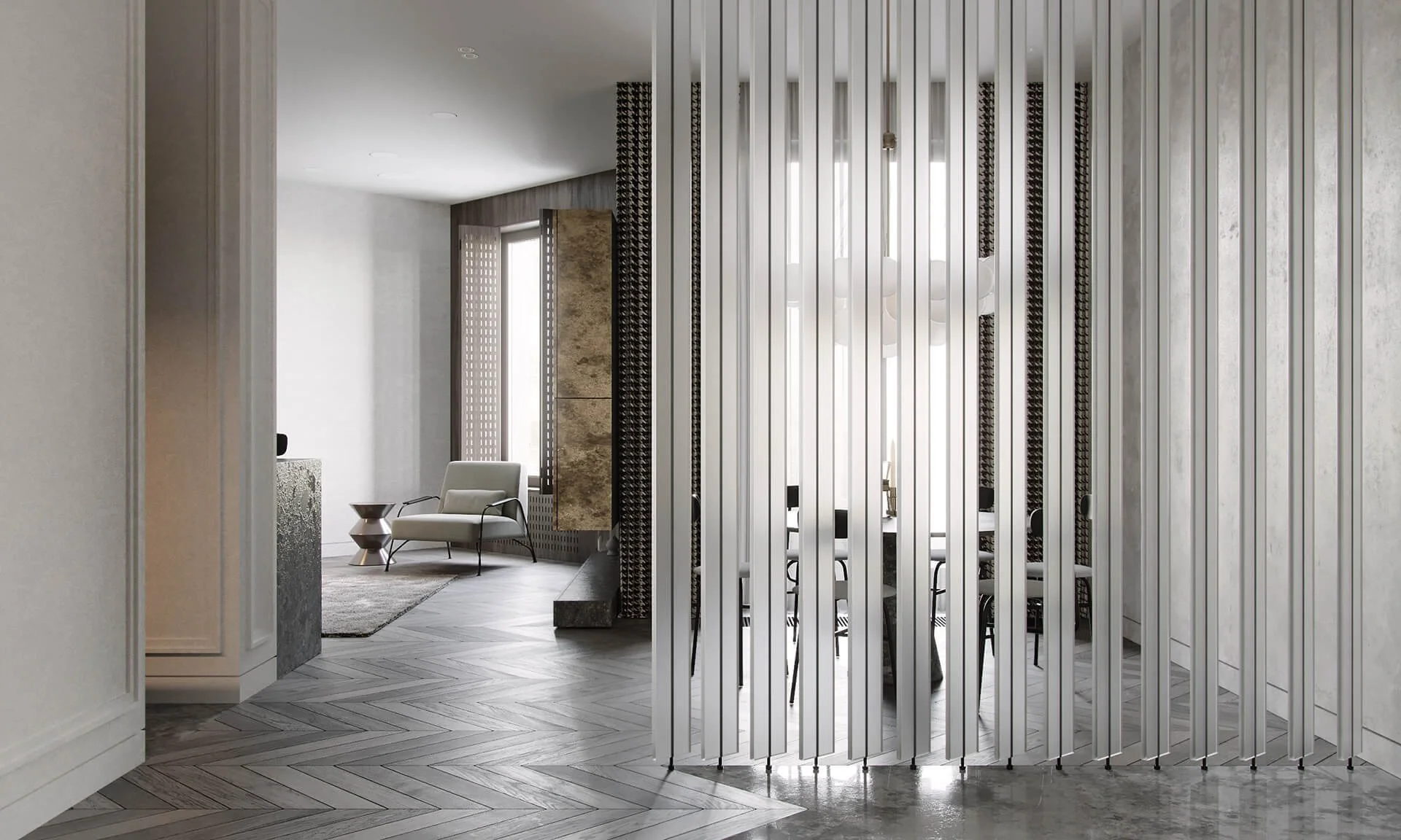 Modern interior space featuring a seating area with a single white armchair, a small side table, and a textured rug. The space is divided by vertical metal slats creating a semi-private area, with natural light coming in through tall windows.