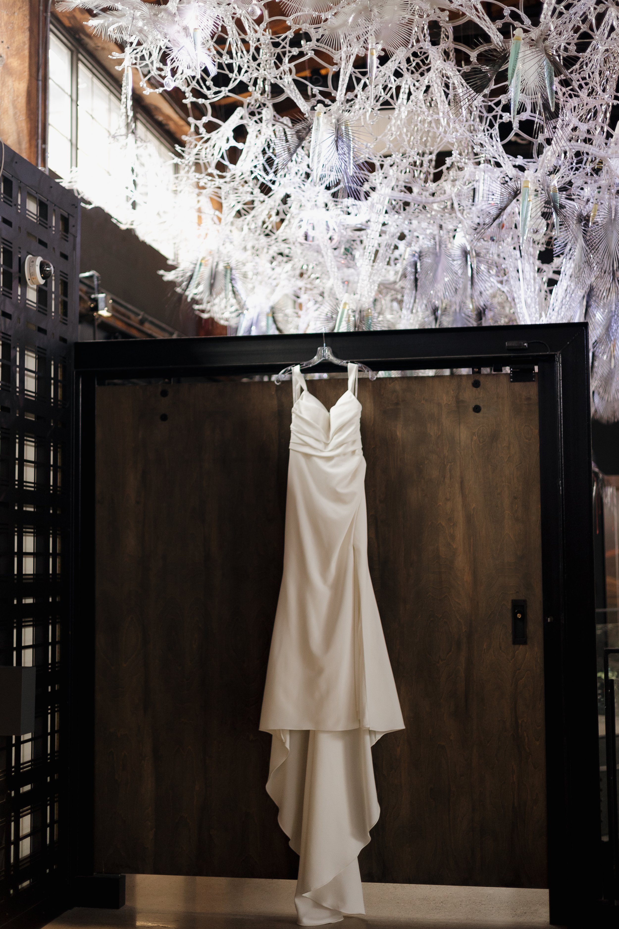 Wedding dress hanging in the Tapestry Hall venue
