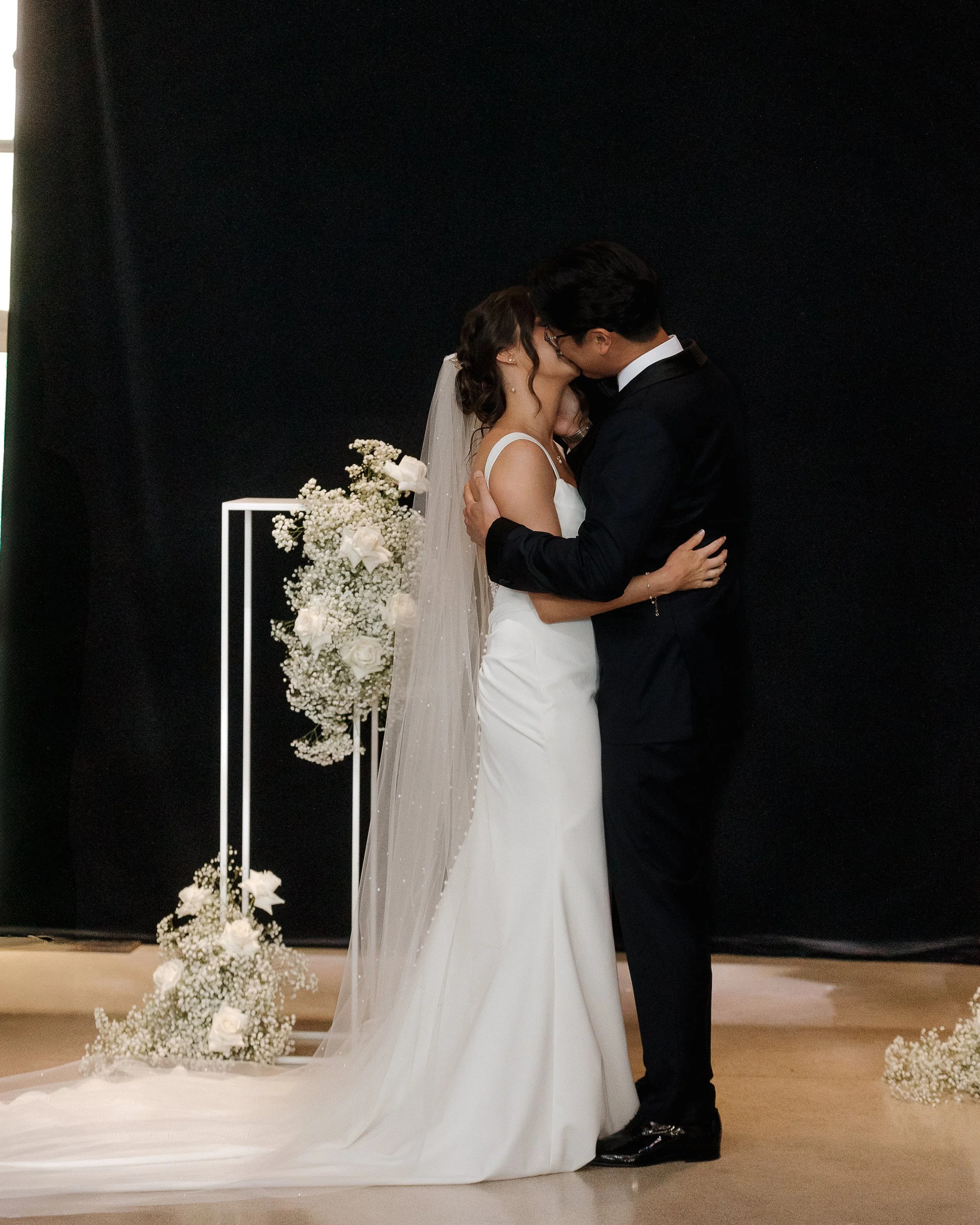 Wedding ceremony at Tapestry Hall in Cambridge Ontario, captured by James and Alyson Photography