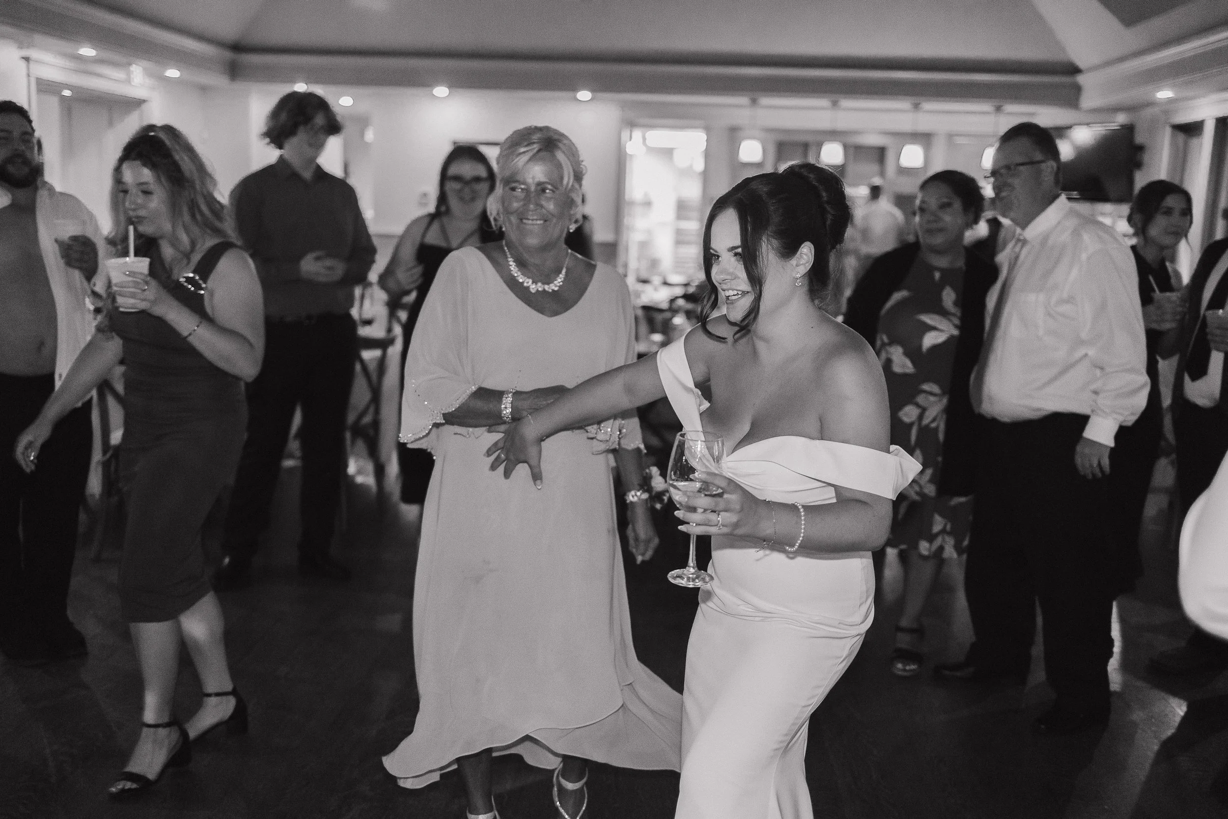 bride dancing with her grandma, Ontario wedding photography by James and Alyson Photography