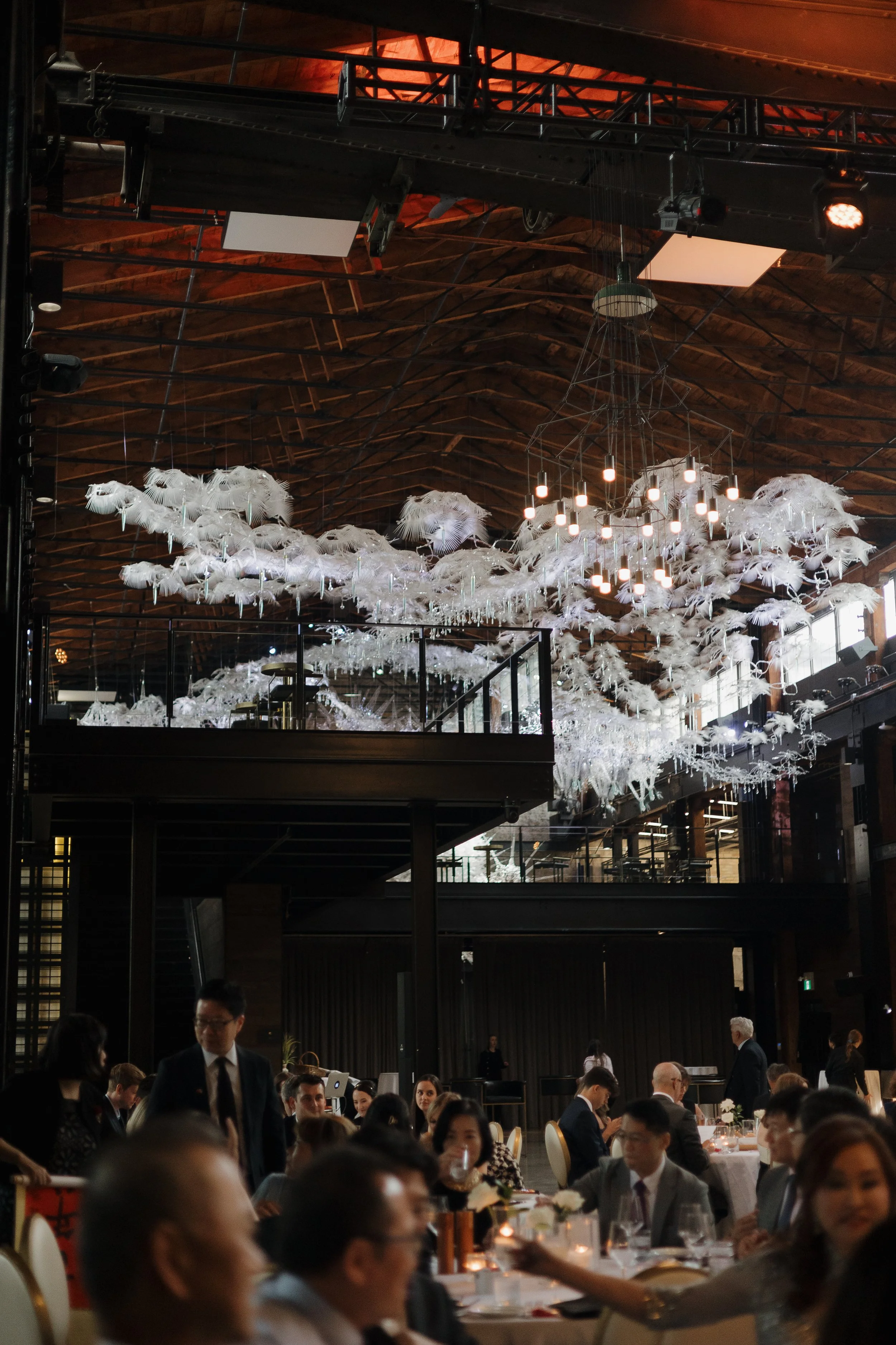 Art installations inside Tapestry Hall wedding venue in Cambridge Ontario, captured by James and Alyson Photography