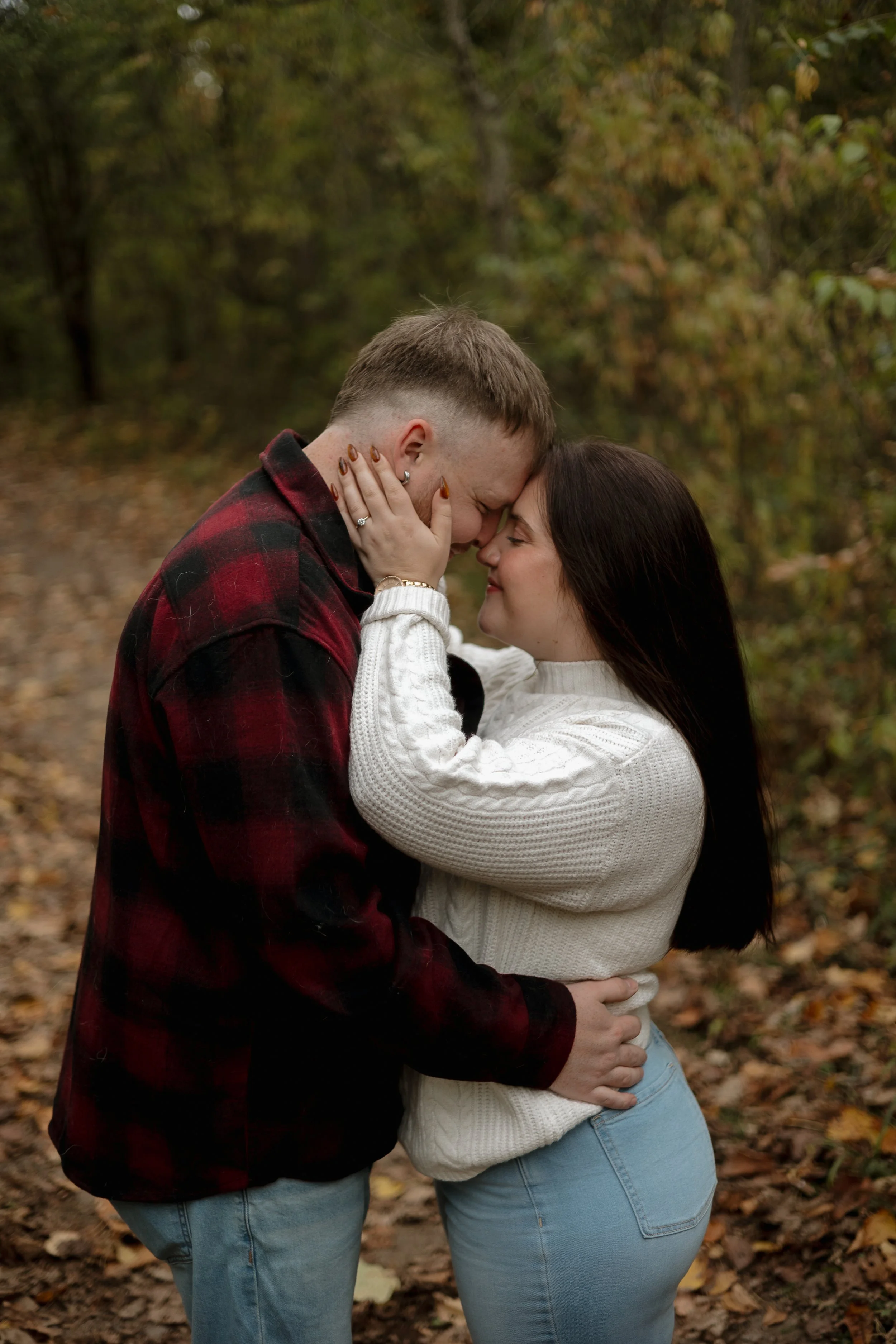 Romantic autumn engagement portrait at Penman’s Pass in Paris Ontario with soft natural light