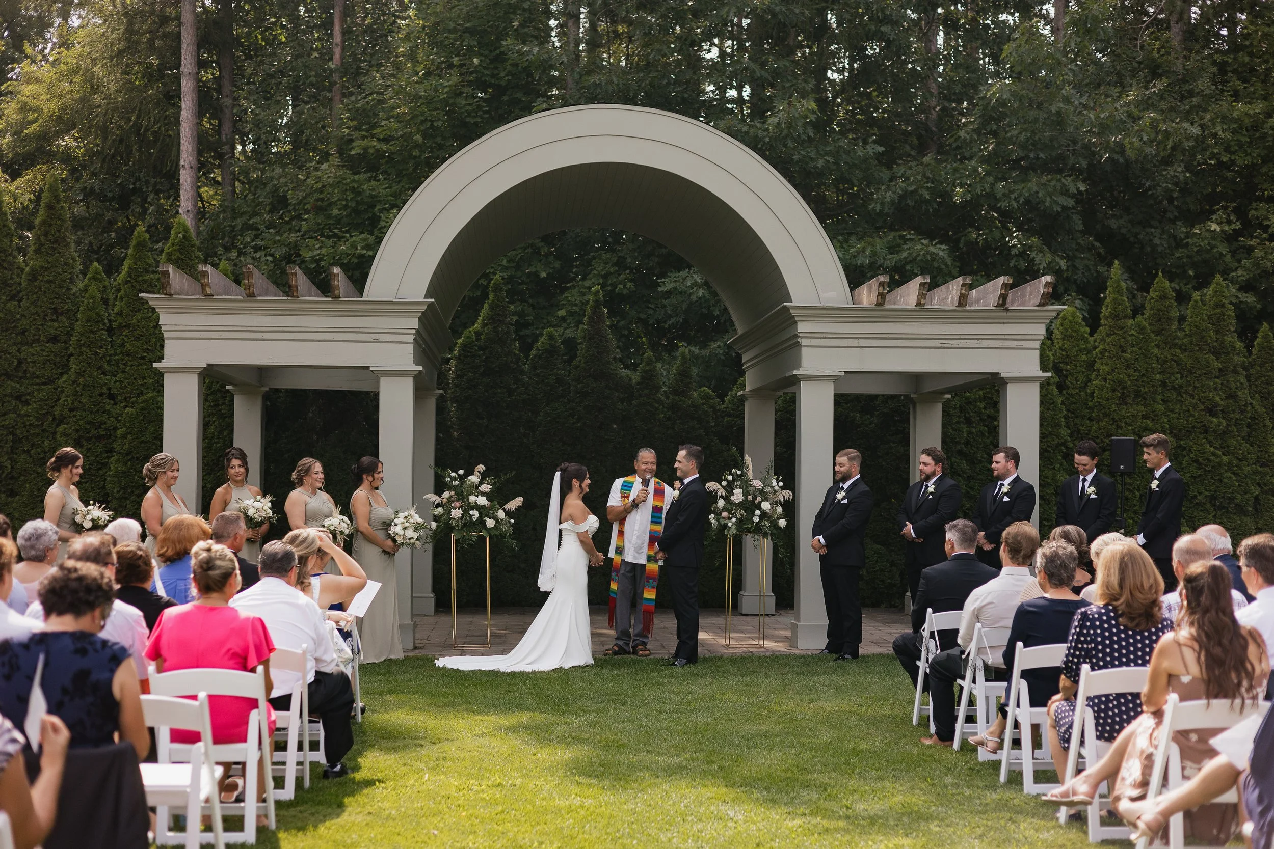 wide shot of outdoor ceremony, ontario wedding photography by james and alyson photo