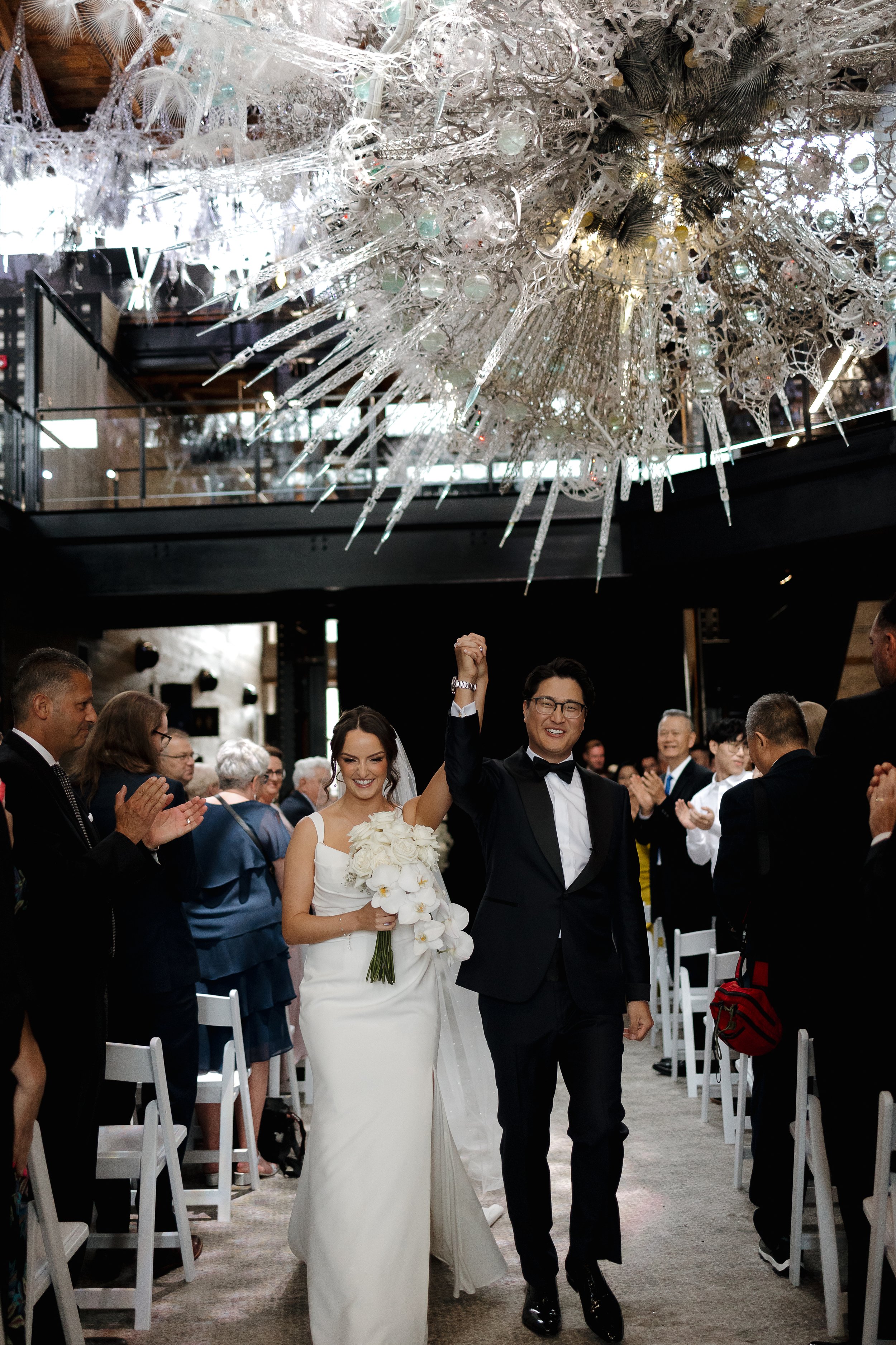 Wedding ceremony at Tapestry Hall in Cambridge Ontario, captured by James and Alyson Photography