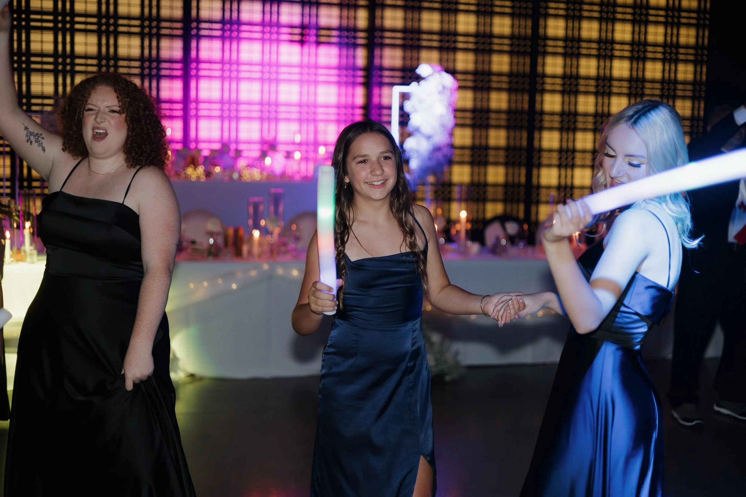 Guests celebrating during a Tapestry Hall wedding, photographed by James and Alyson Photography