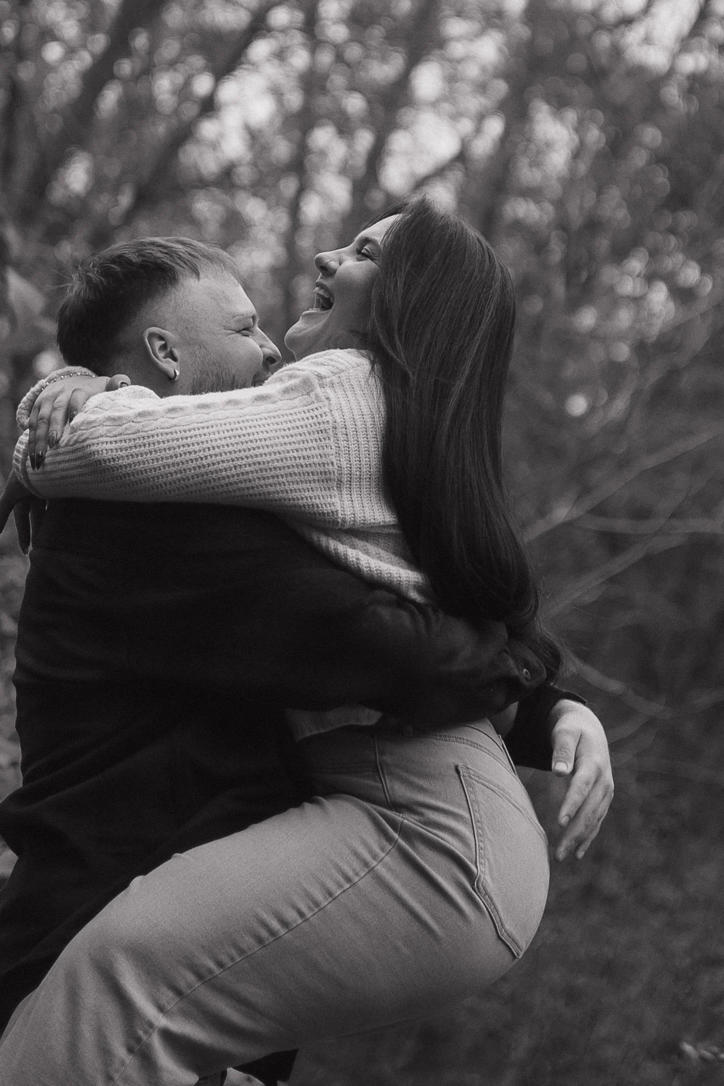 Playful fall engagement session in Paris Ontario at Penman’s Pass with natural laughter