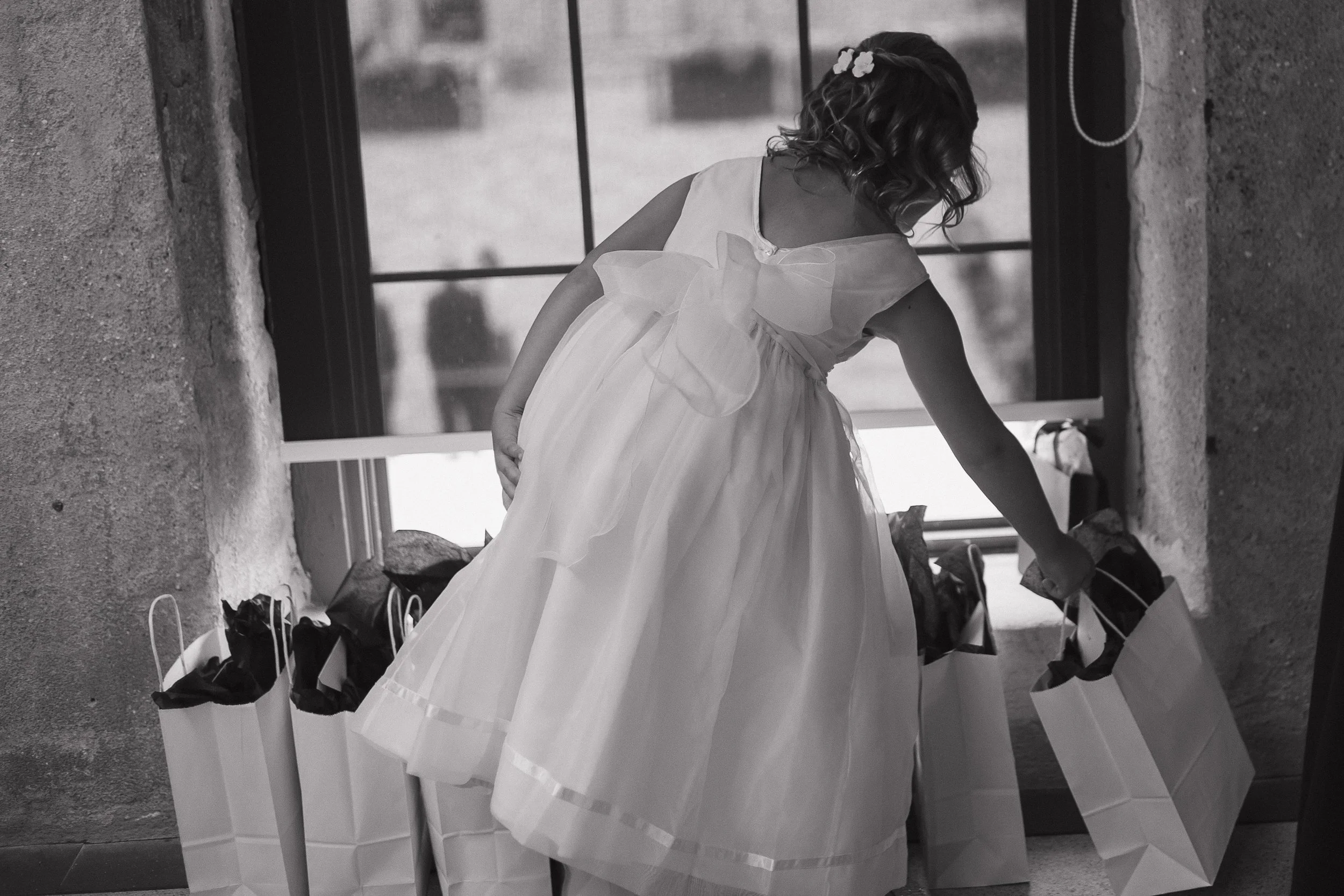 flower girl handing out gifts at Tapestry Hall Cambridge Ontario