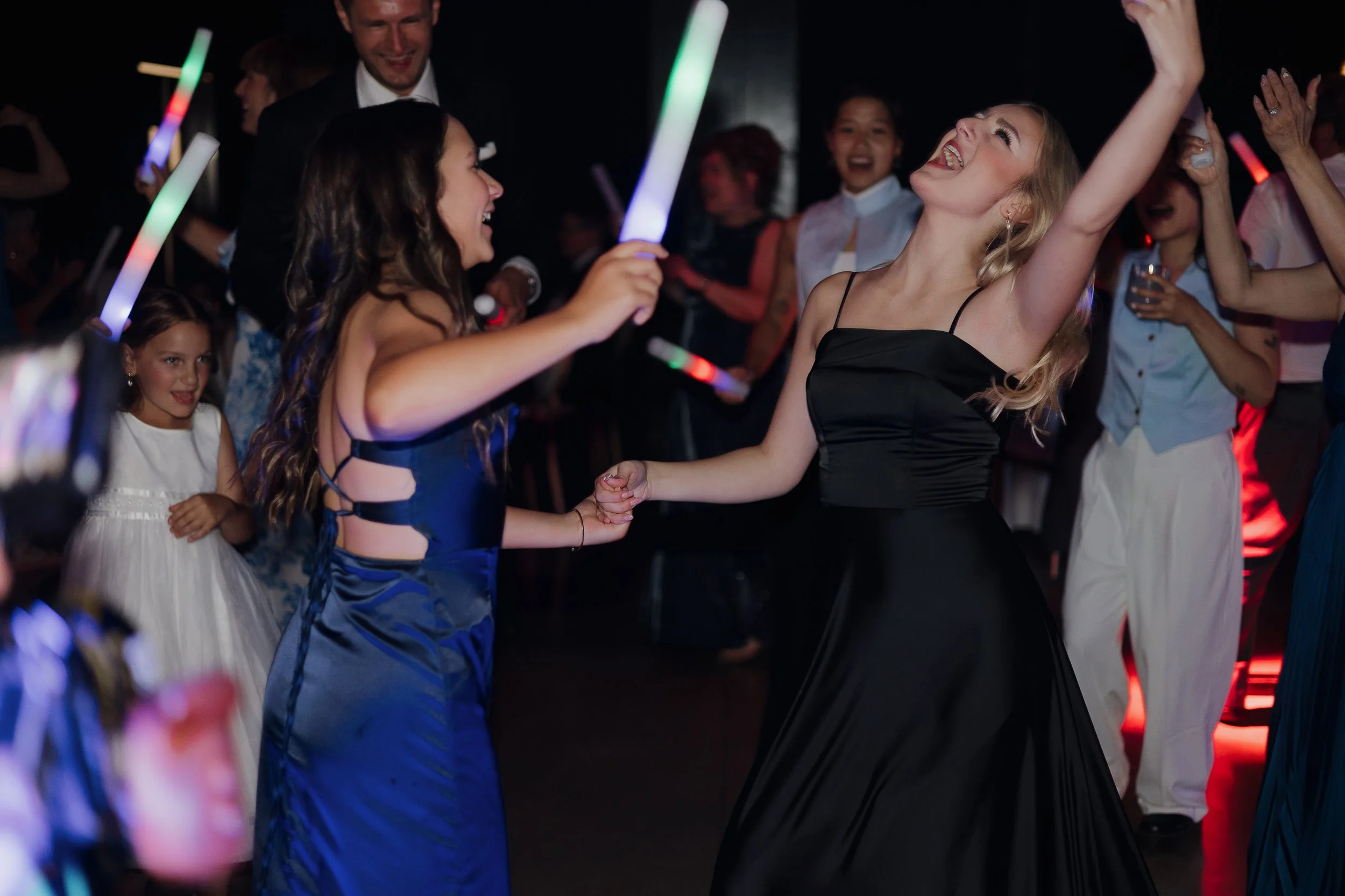 Guests celebrating during a Tapestry Hall wedding, photographed by James and Alyson Photography