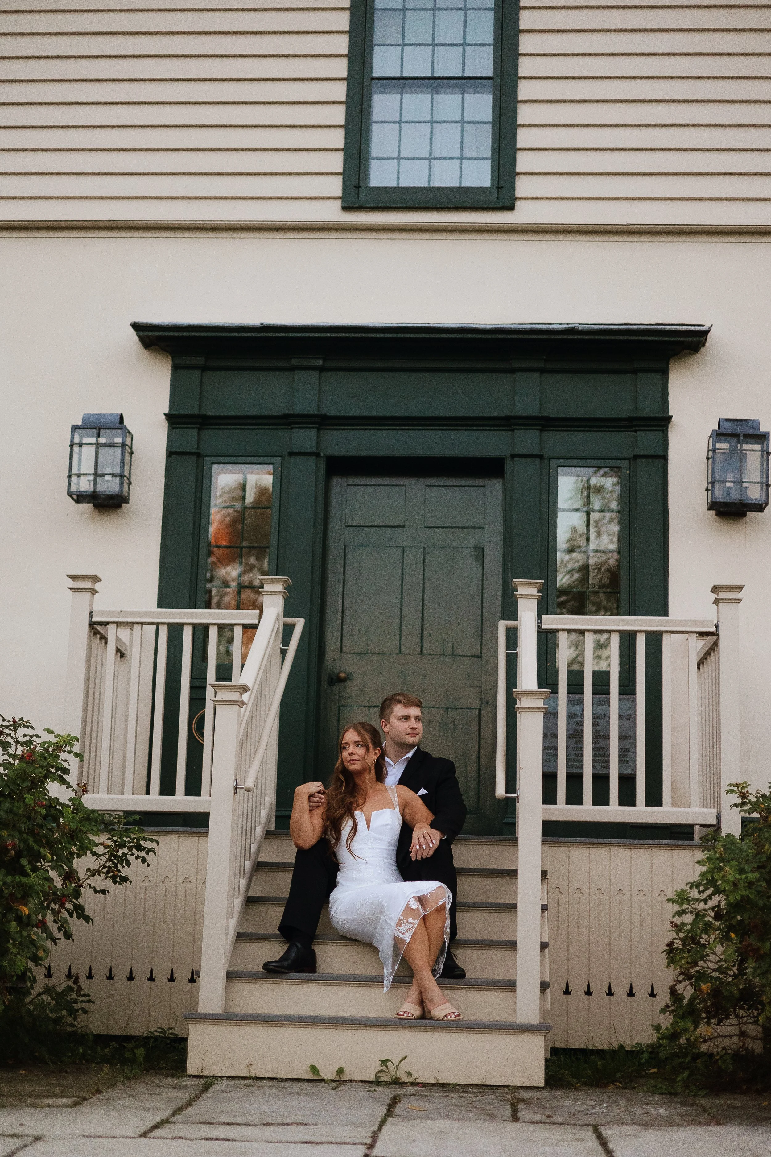 Editorial pose during an engagement session at Battlefield House and Museum in Hamilton Ontario, photographed by James and Alyson Photo