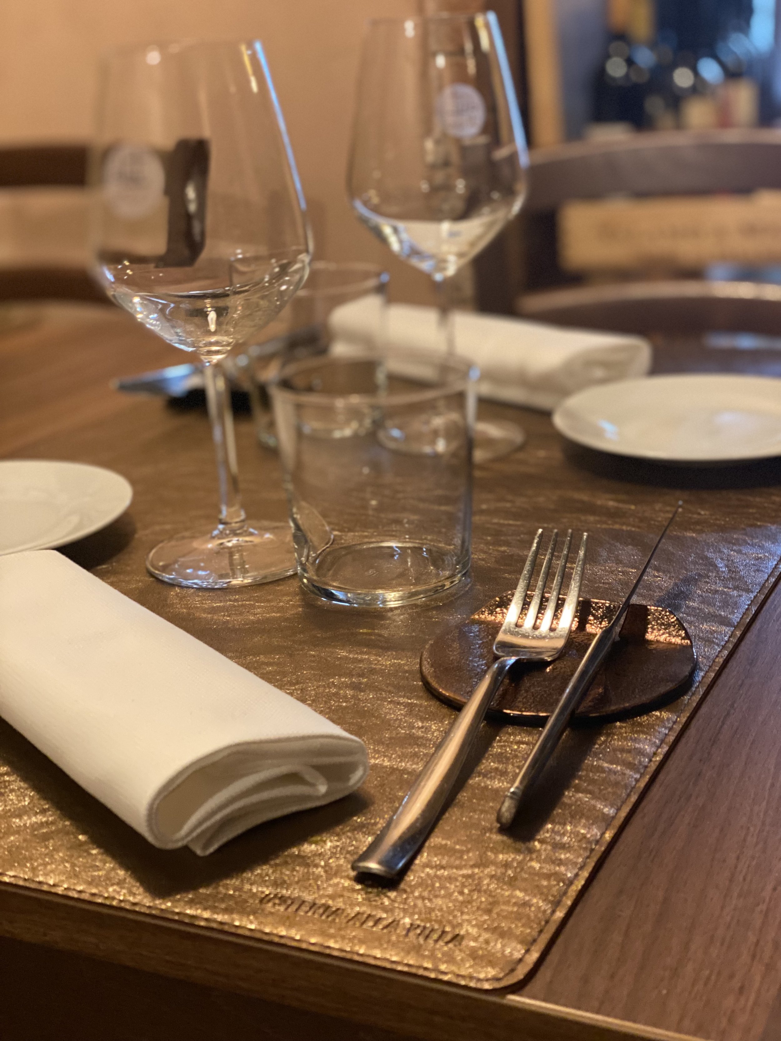 Modern, updated table settings in a historic Tuscany village makes for an excellent authentic wine and food experience.