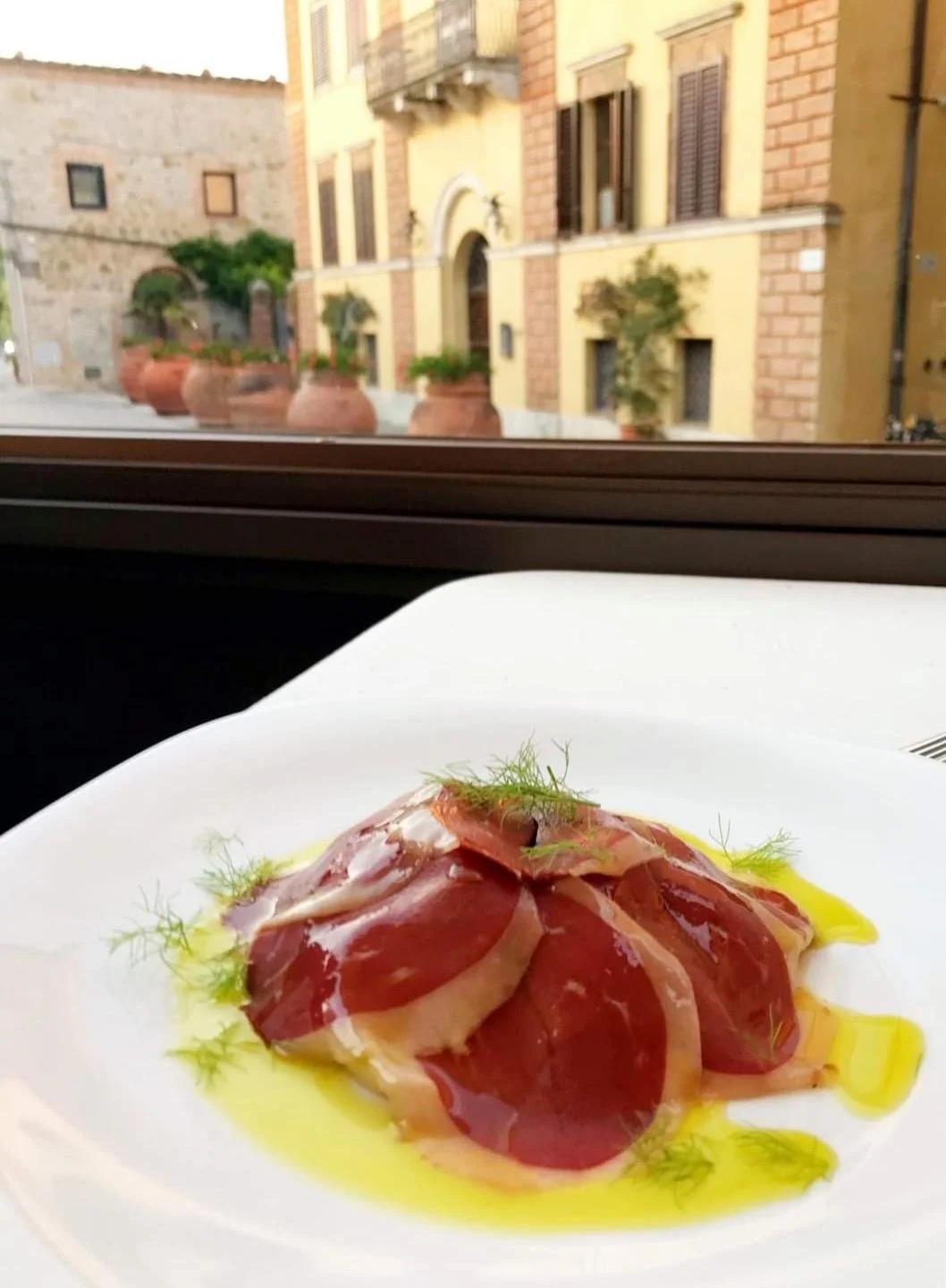 Foodies and wine lovers enjoy the perfectly paired menu at Osteria Alla Villa in Tuscany Italy. Food and Wine Influencers will not be disappointed.