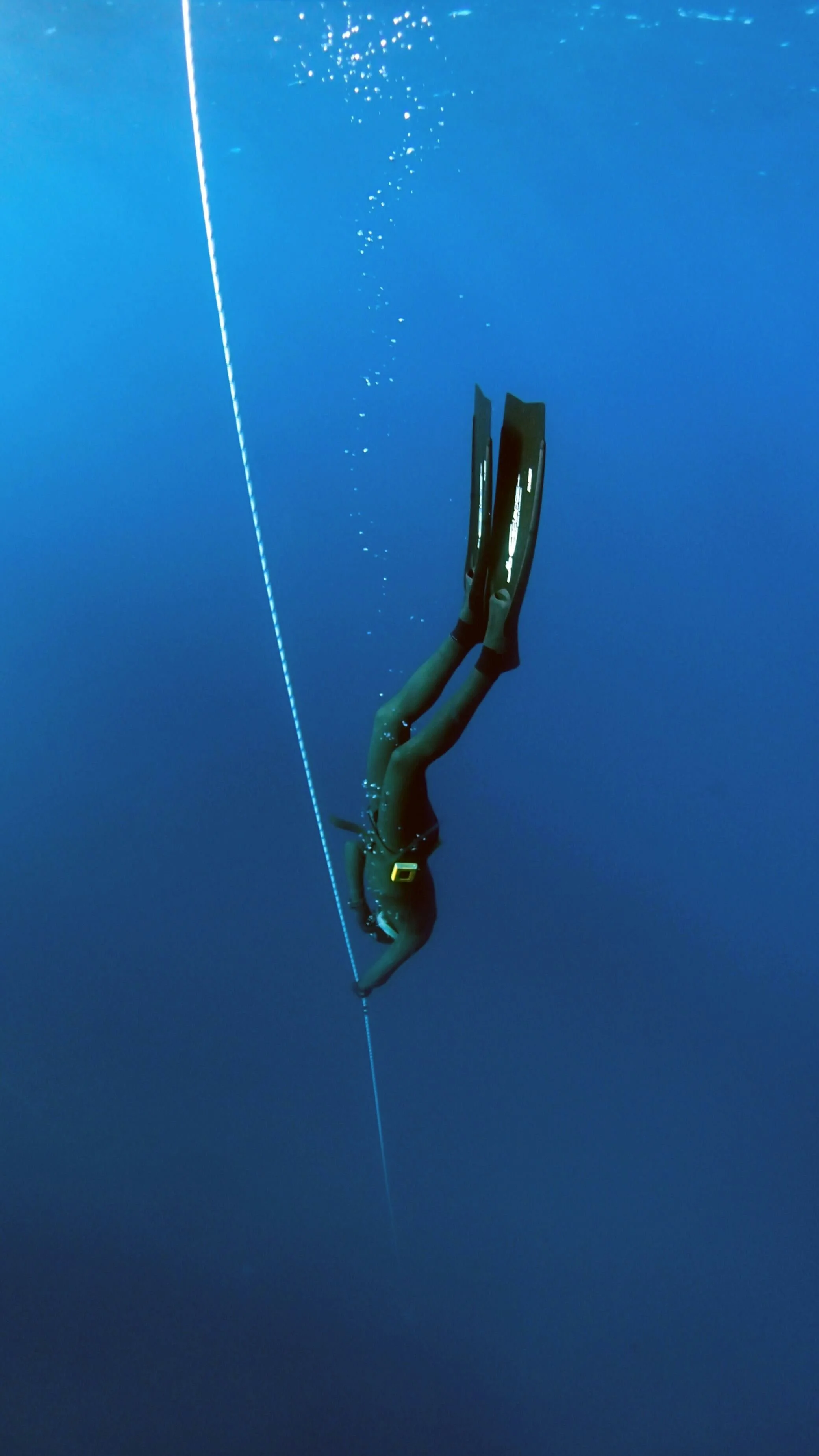freestyle diver in deep ocean
