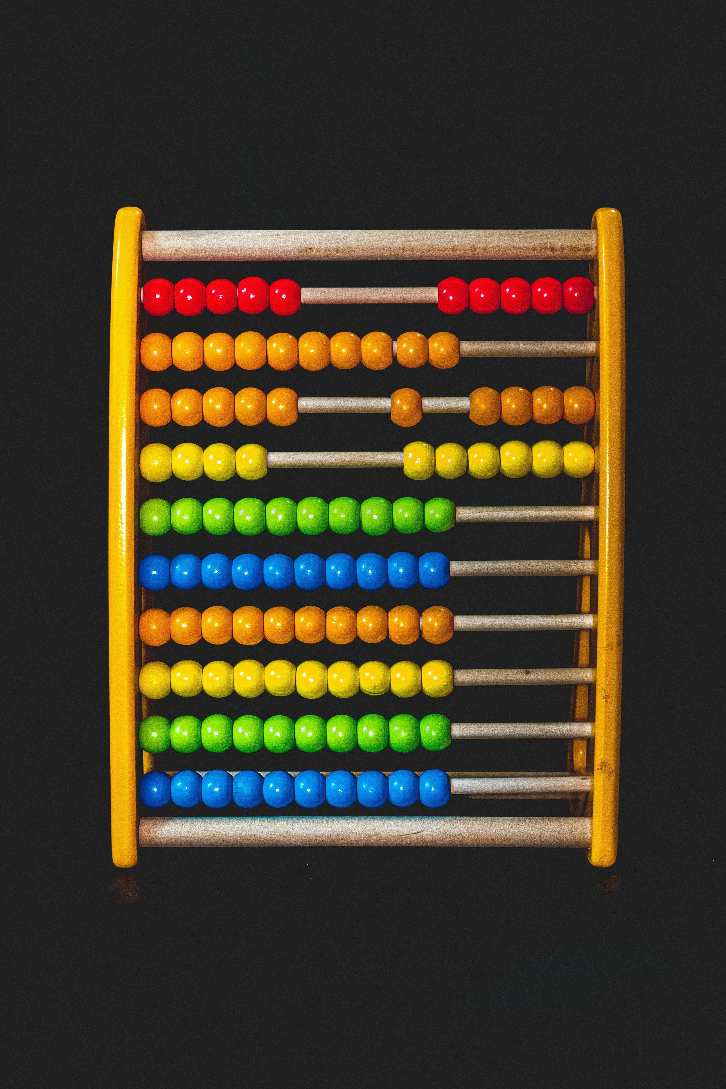 abacus colourful beads on black background
