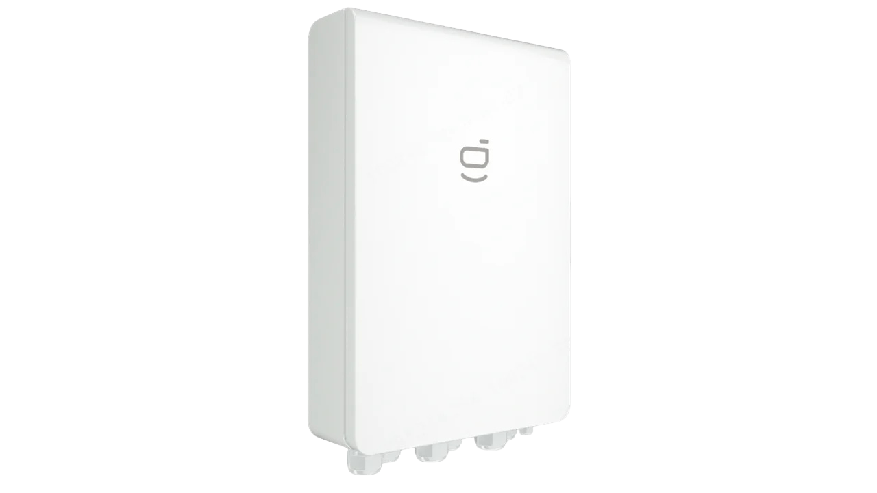 A white electronic device mounted on a wall with a logo on the front.
